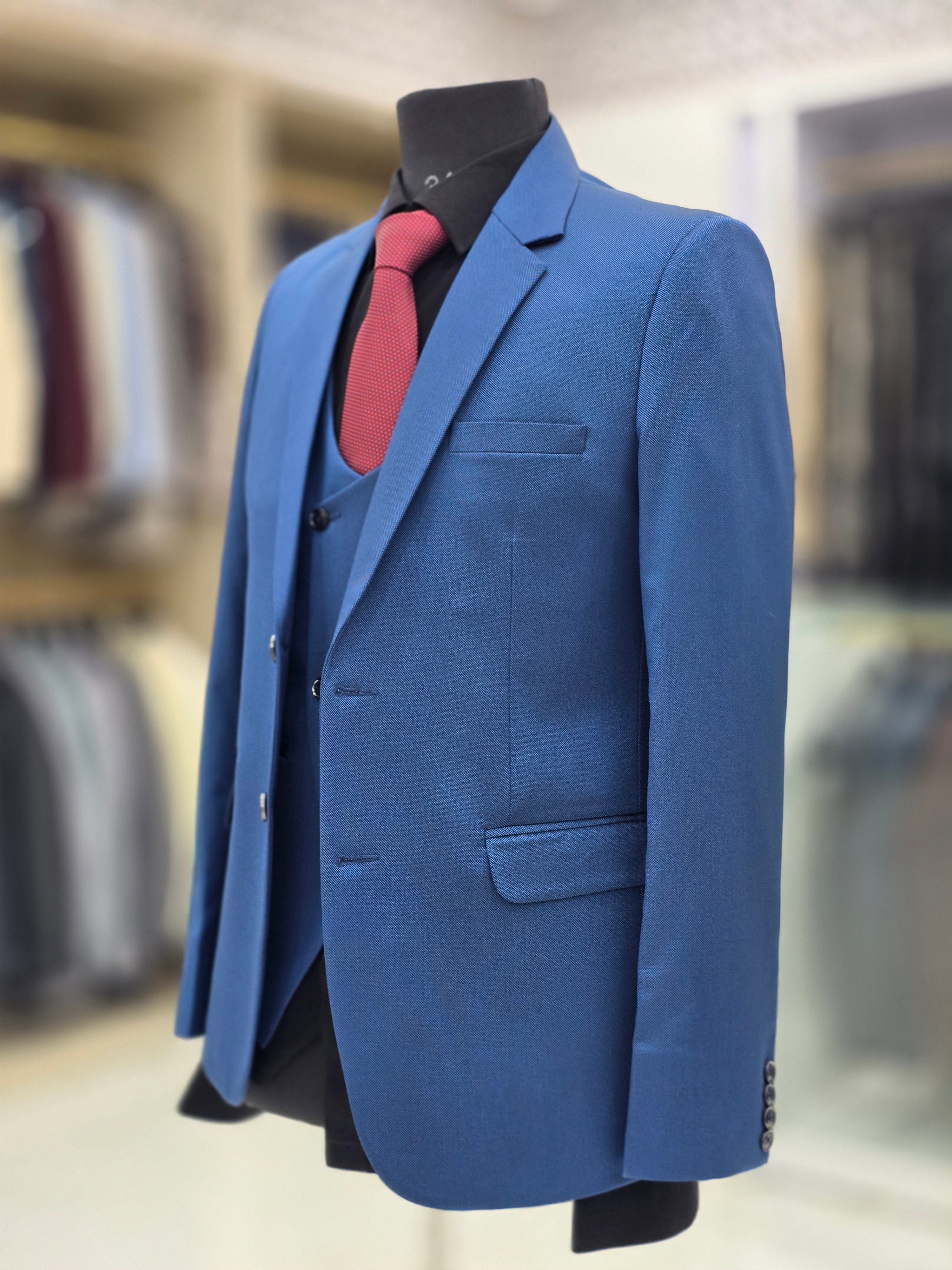 Vibrant royal blue colour formal three piece suit with pants blazer and waistcoat
