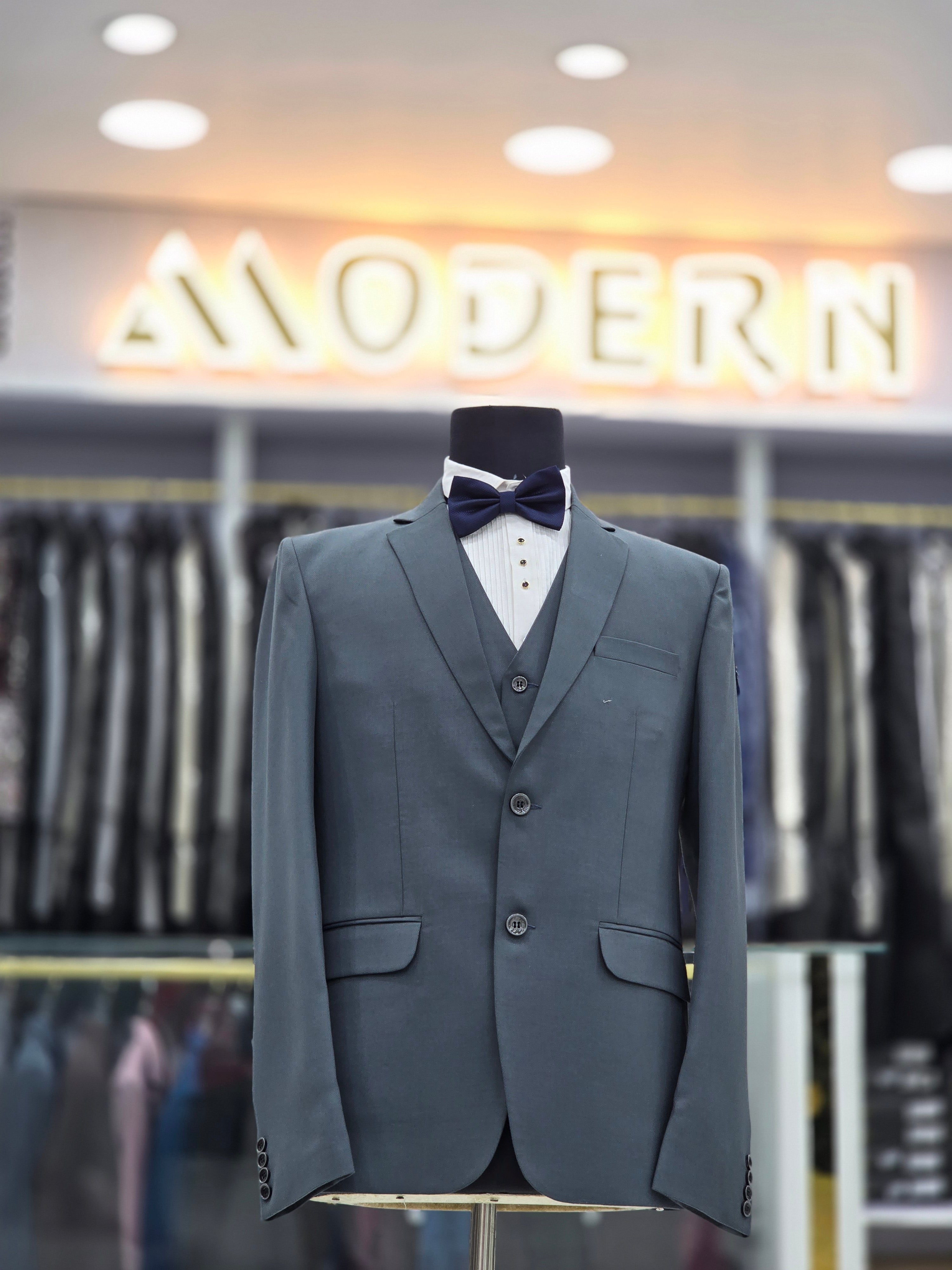 Sage green coloured self design formal suit 3 piece with pants blazer and waistcoat
