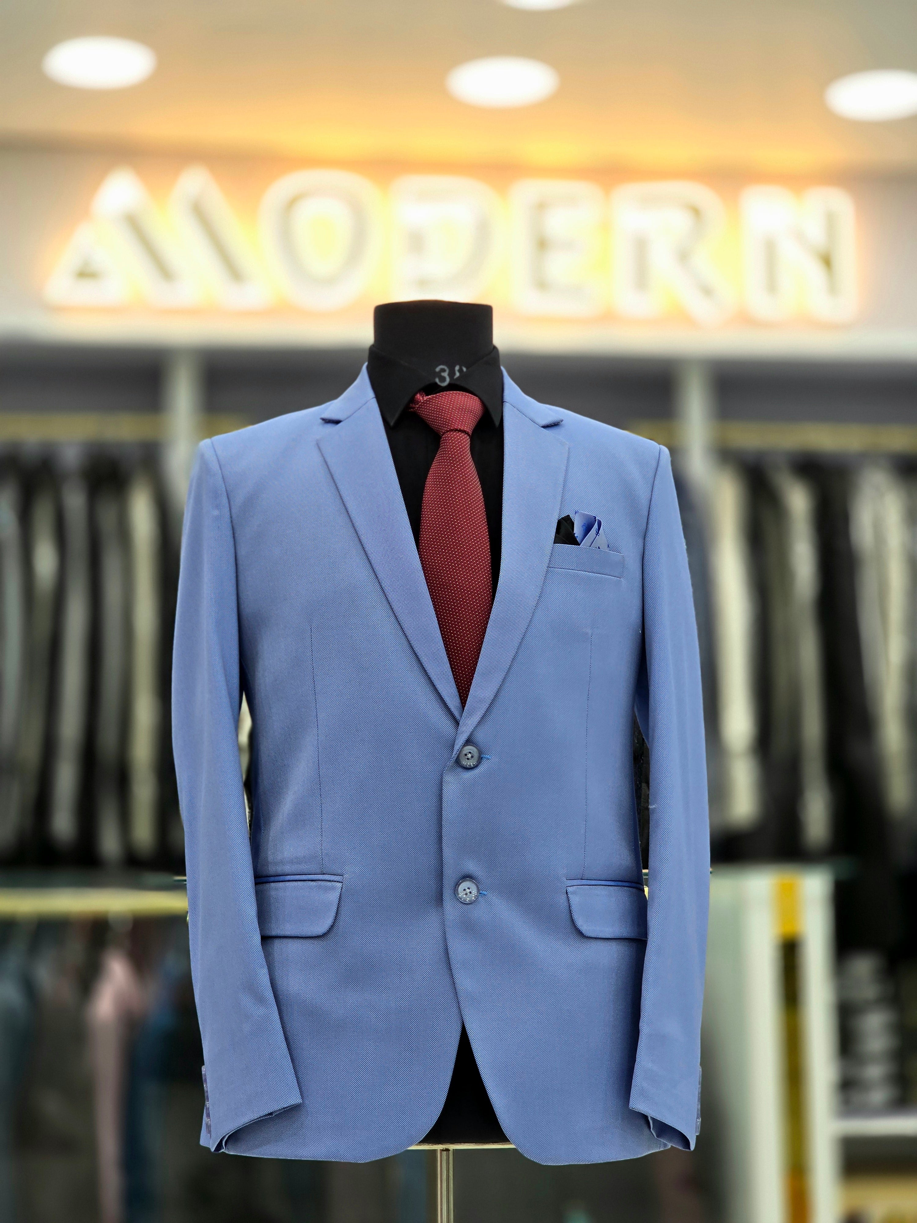 Sky blue coloured formal two piece suit with blazer and pants