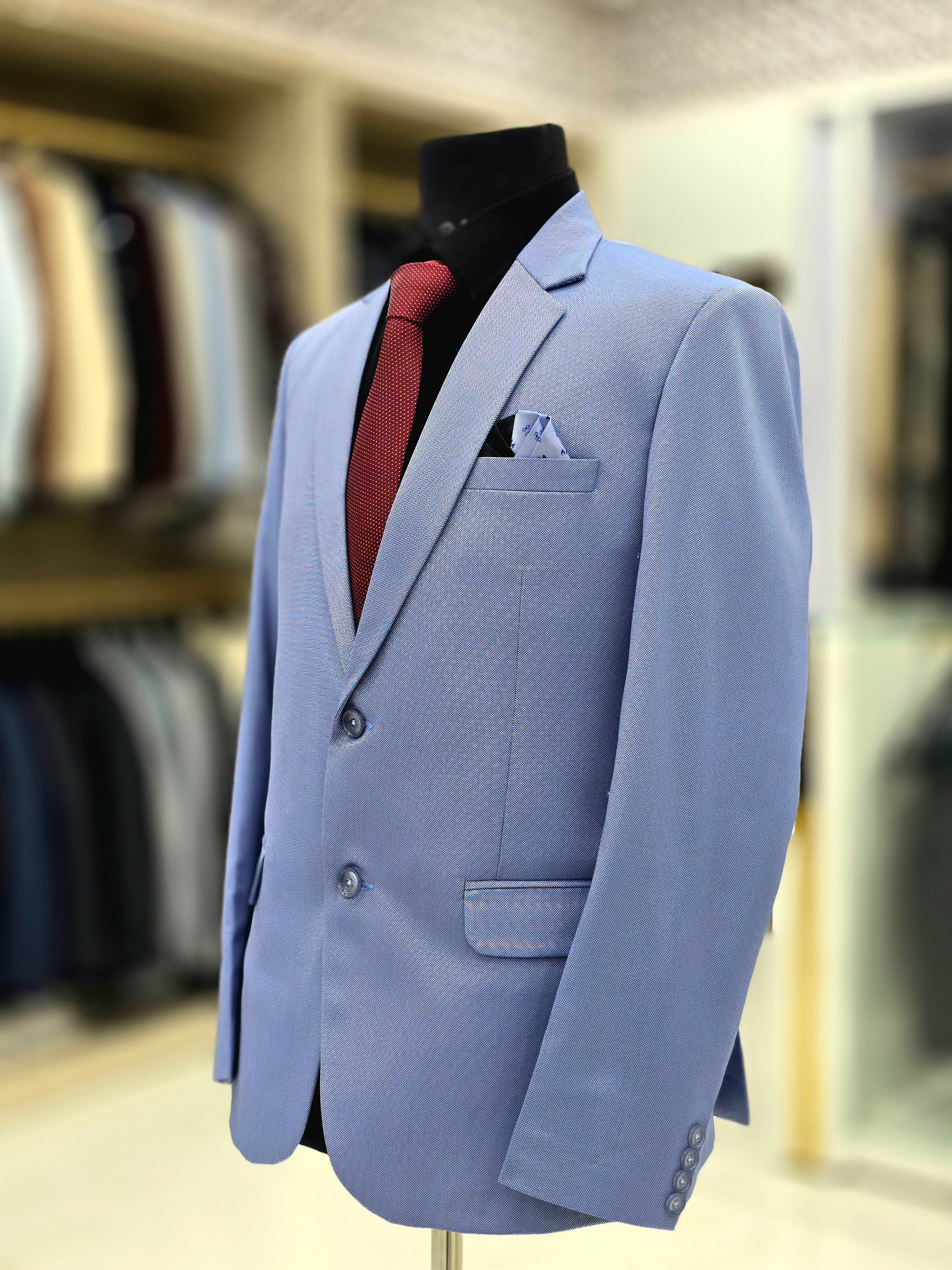 Sky blue coloured formal two piece suit with blazer and pants