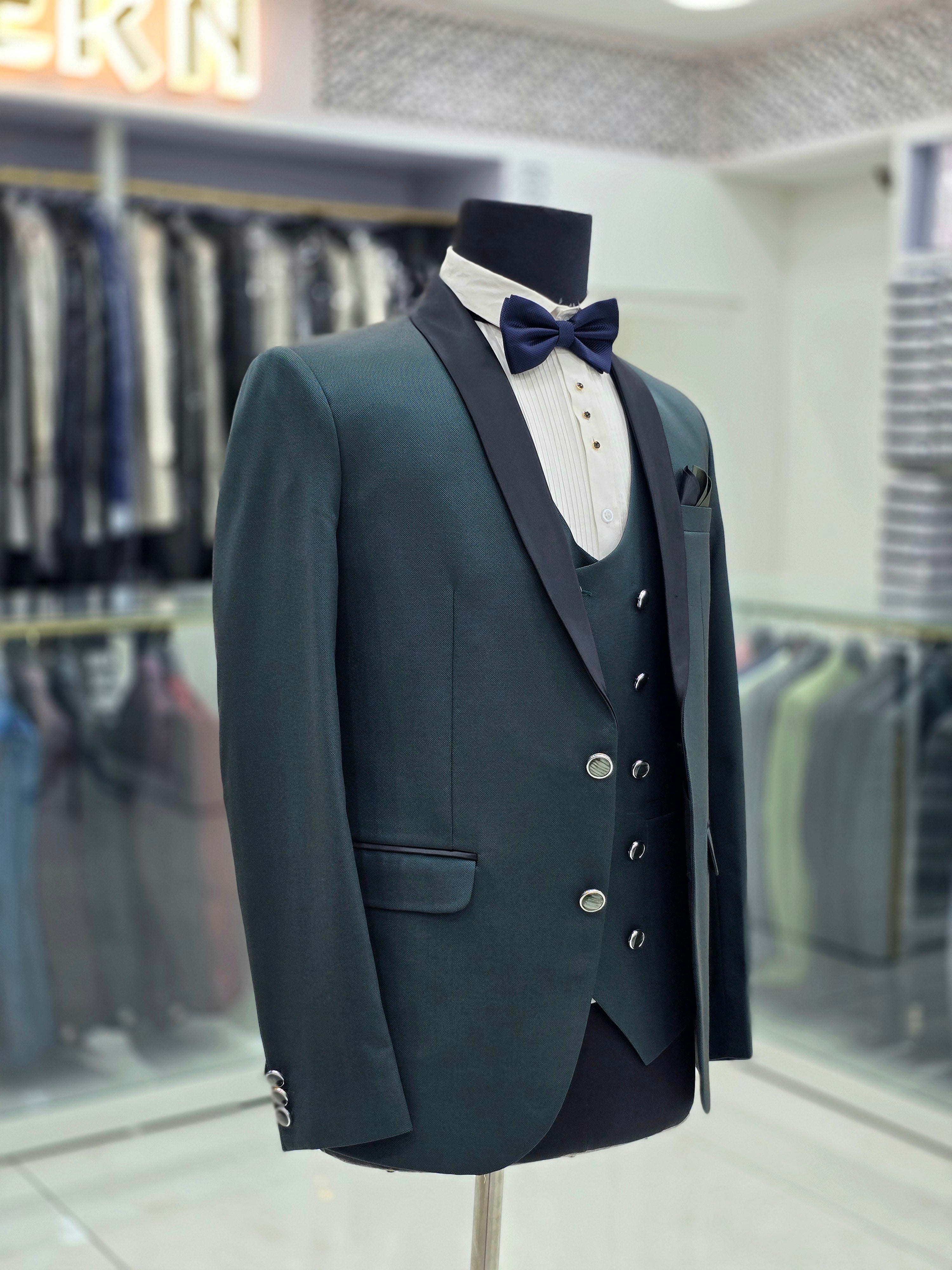 Bottle green coloured formal tuxedo three piece with pants blazer and double breast waistcoat