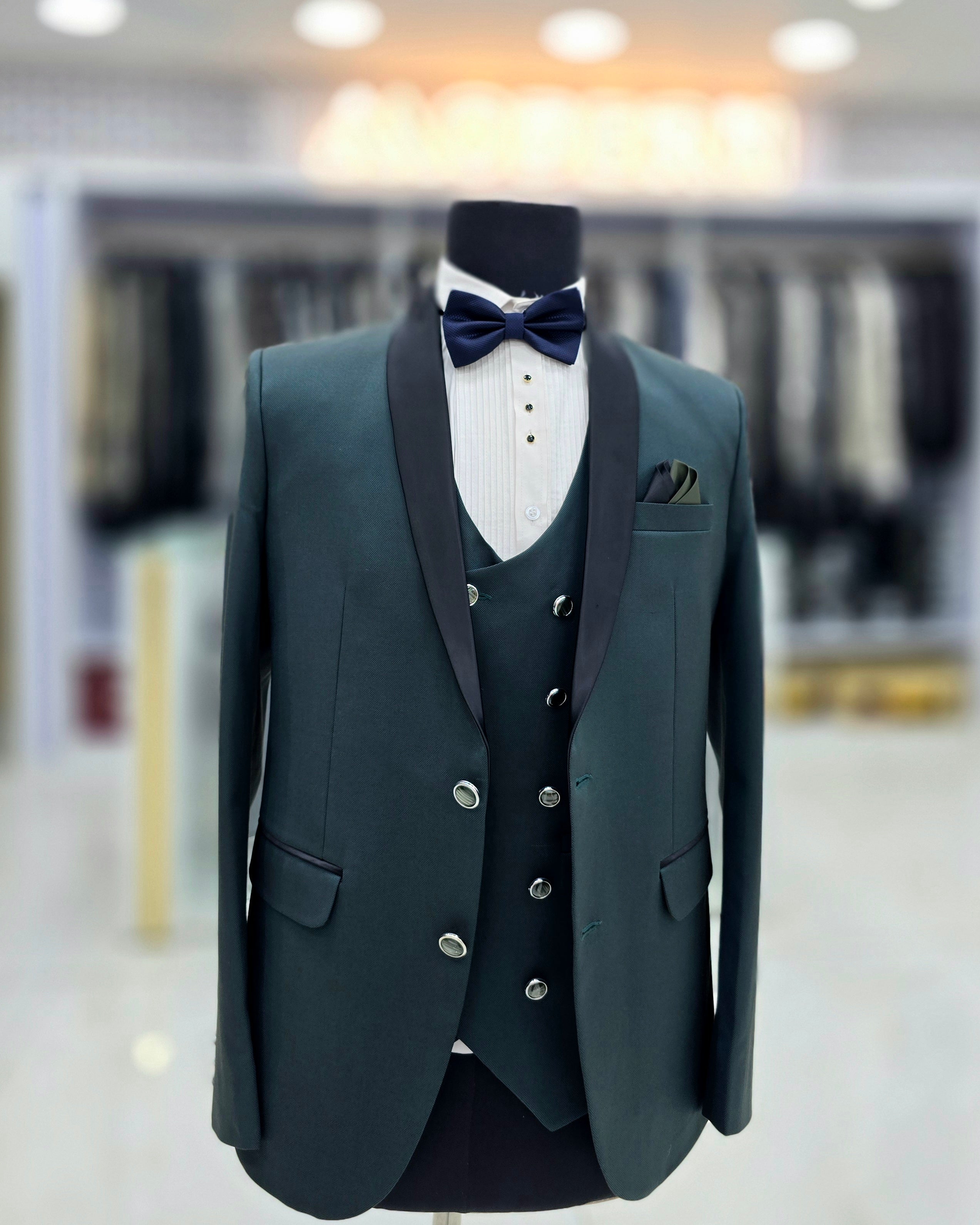 Bottle green coloured formal tuxedo three piece with pants blazer and double breast waistcoat