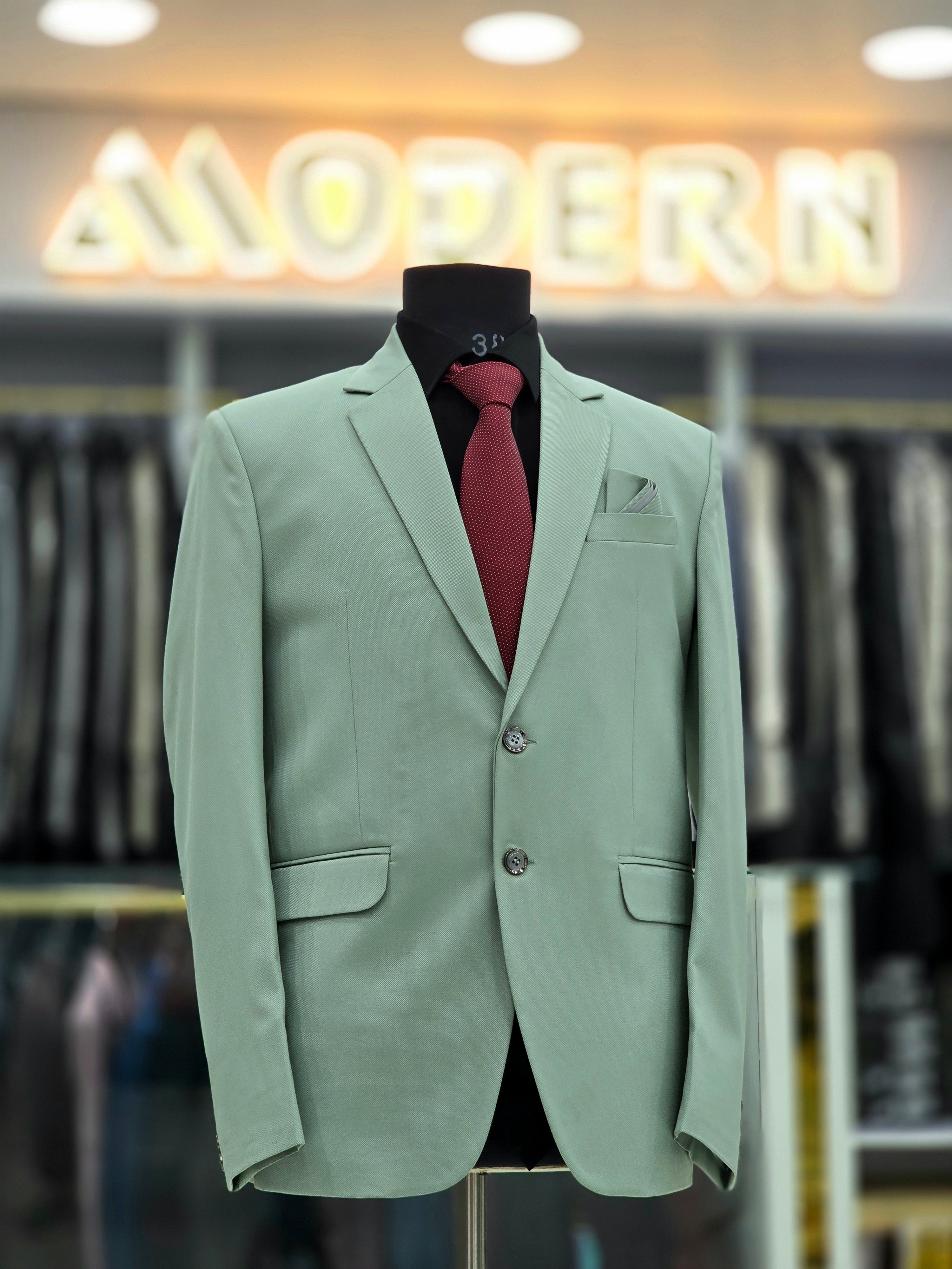 Elegant green colour formal two piece suit with pants and blazer