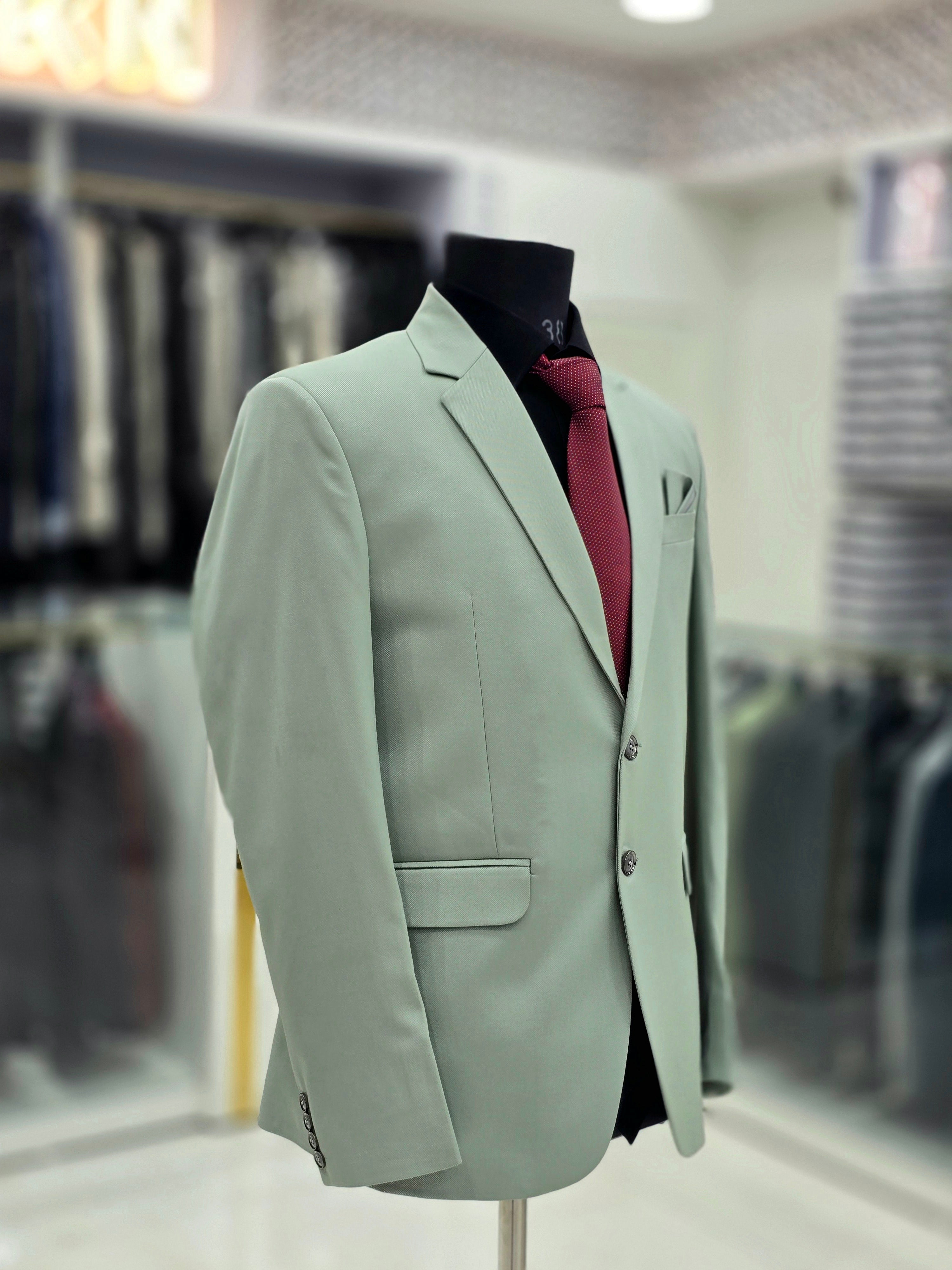 Elegant green colour formal two piece suit with pants and blazer