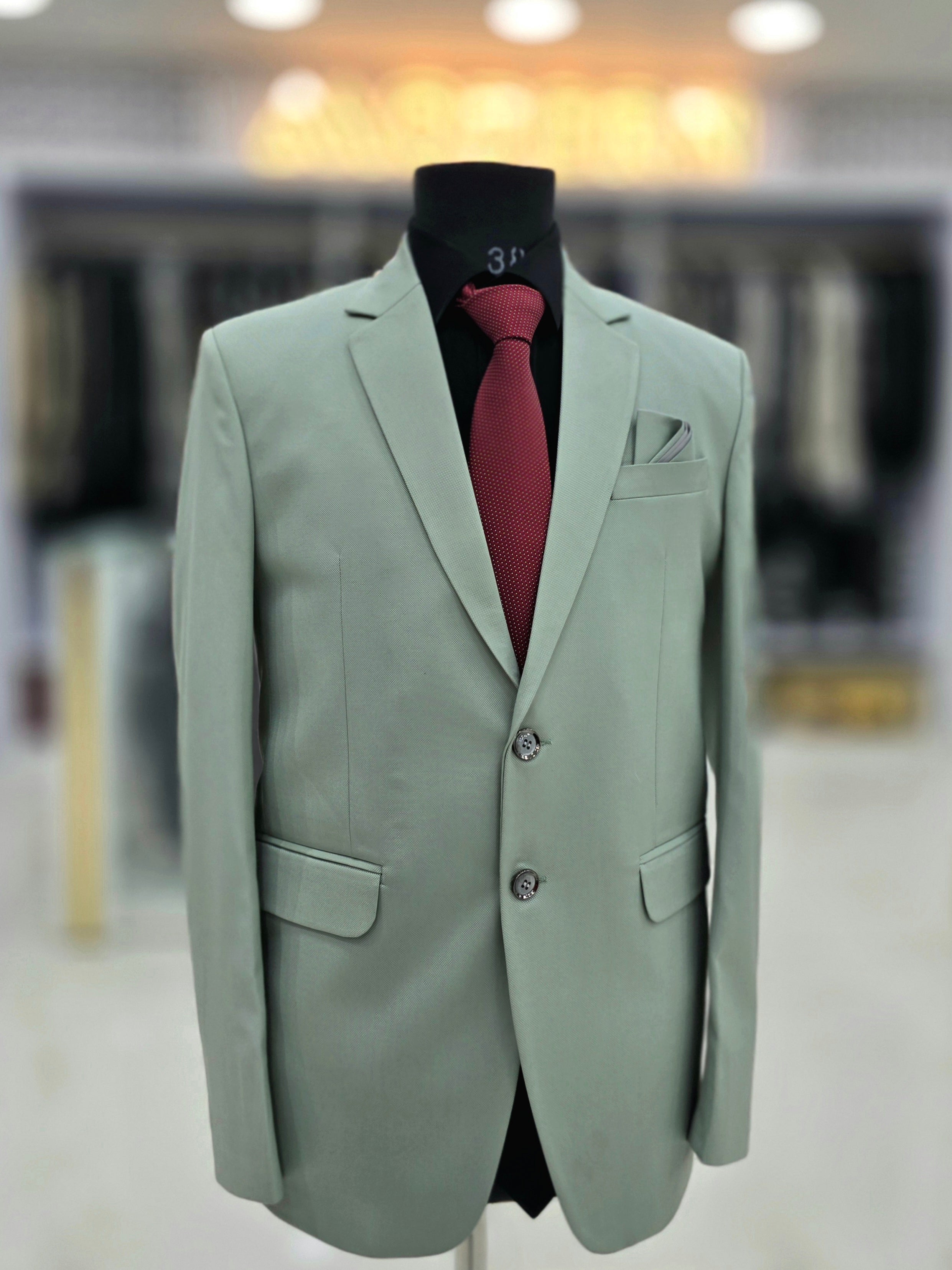 Elegant green colour formal two piece suit with pants and blazer