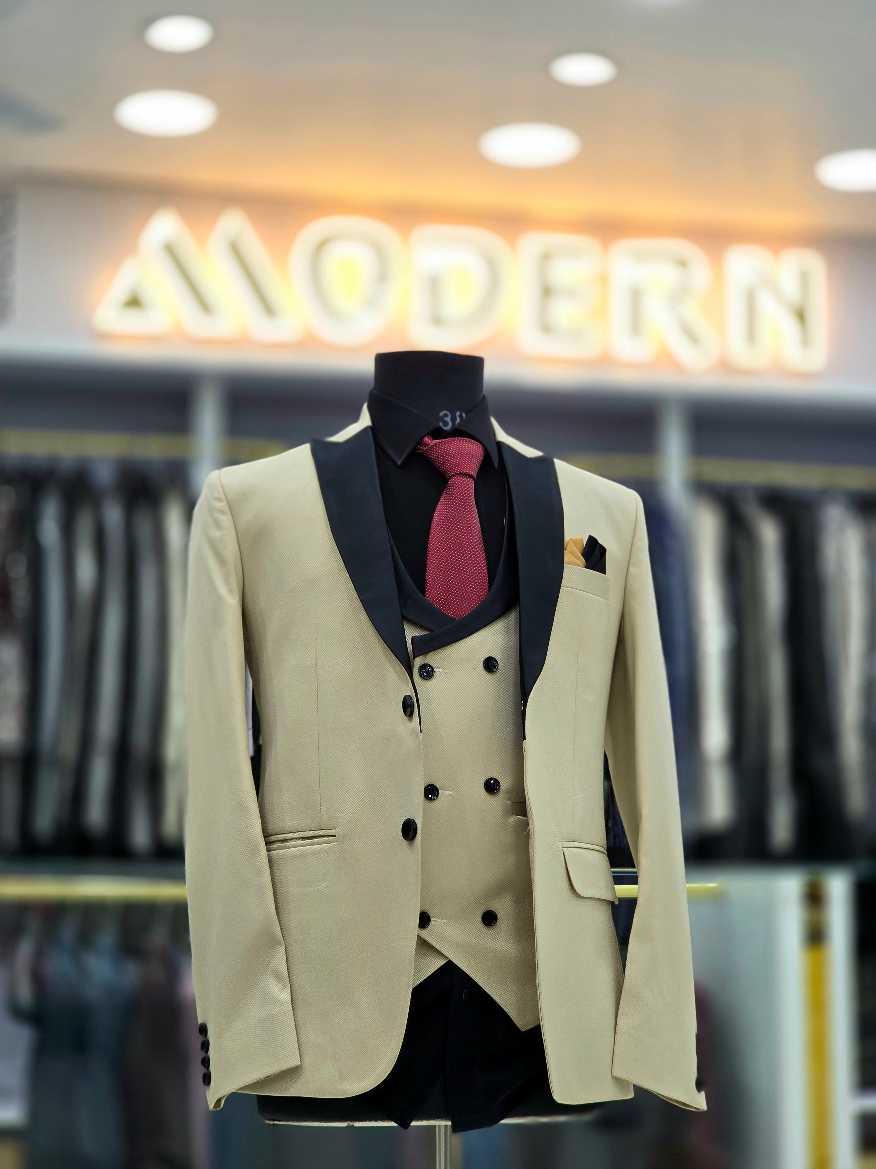 Stylish beige colored formal three piece Tuxedo with blazer pants and double breast waistcoat
