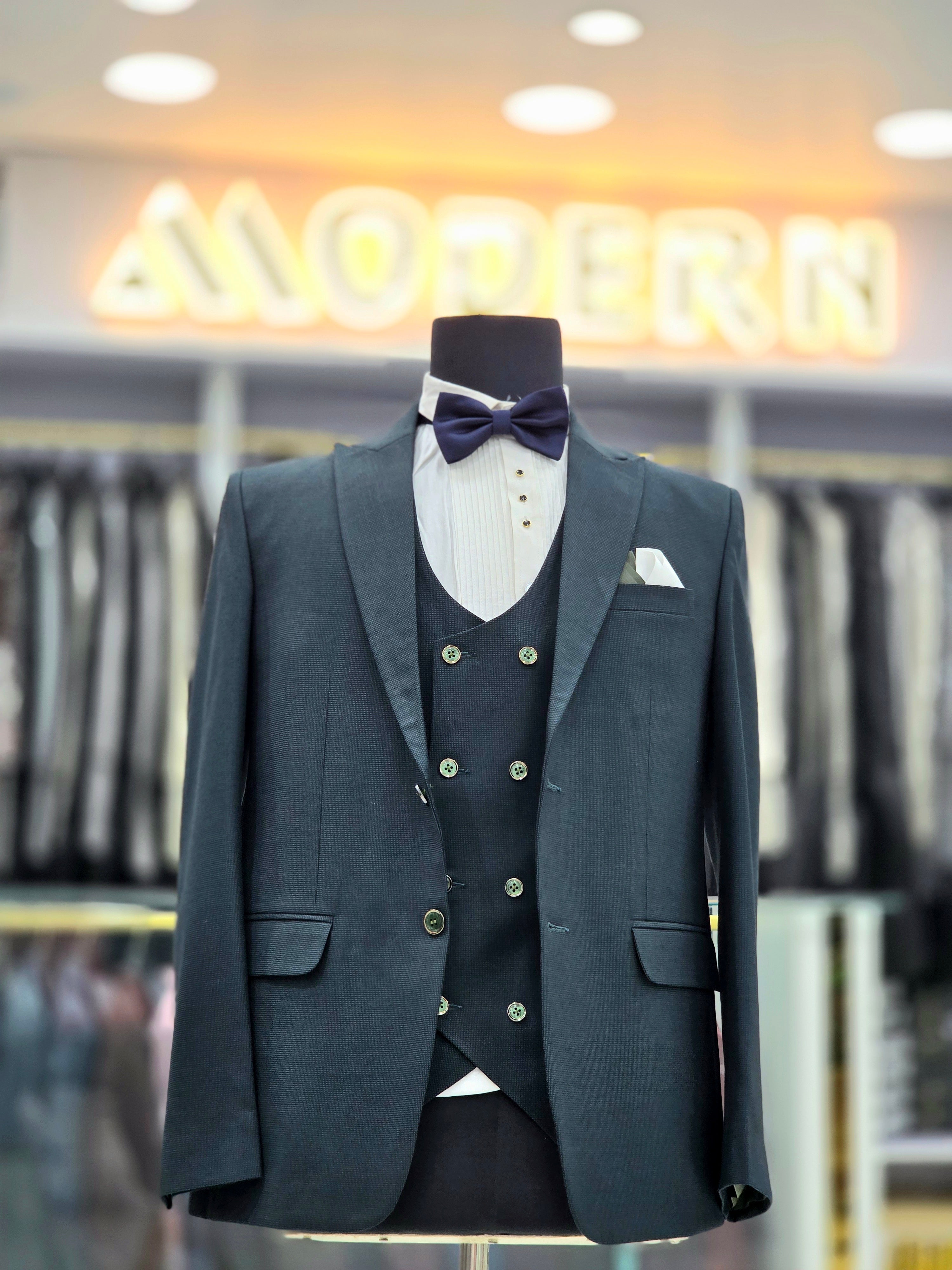Teal green coloured self design formal three piece suit with Blazers pants and double breast waistcoat