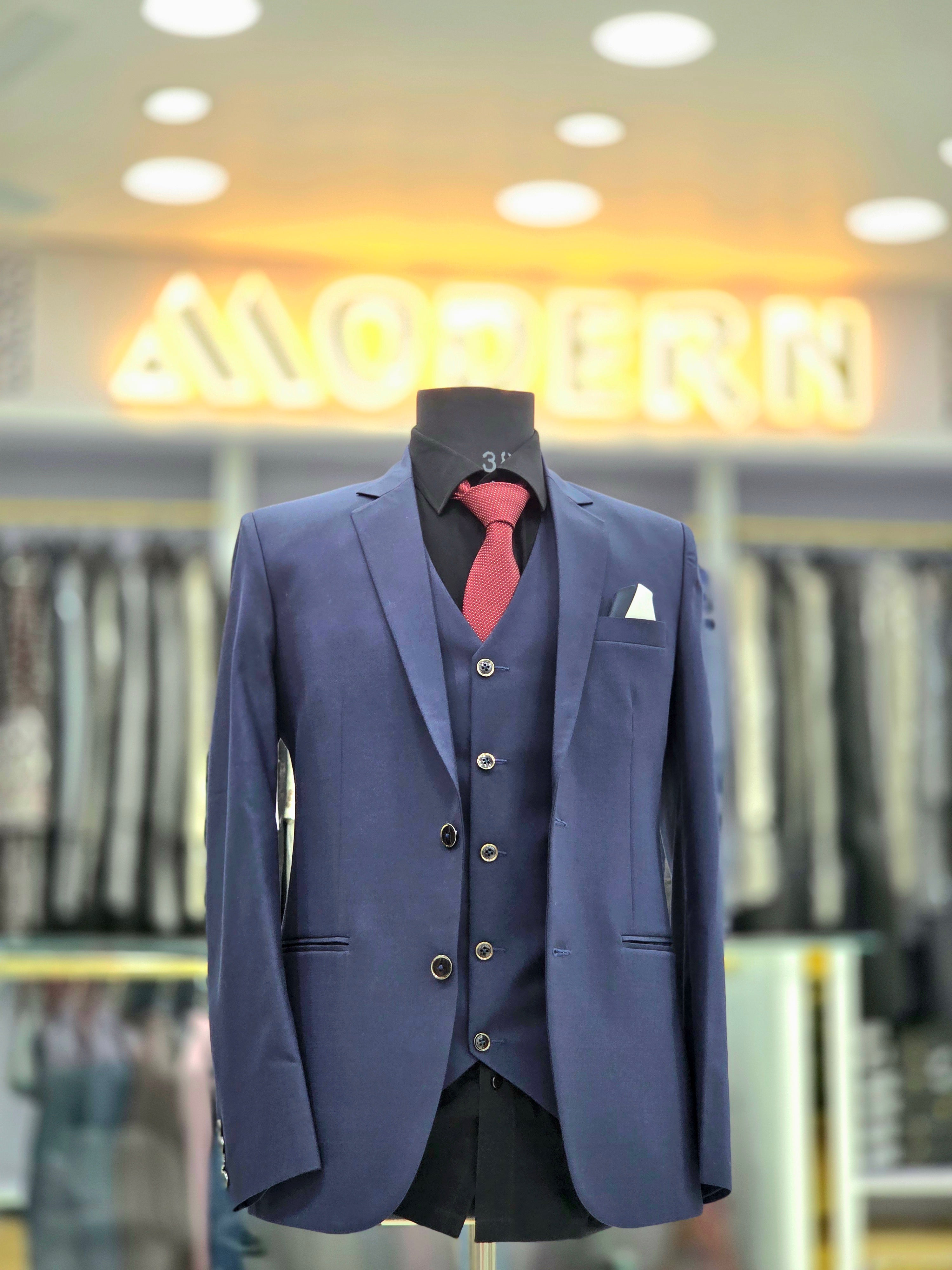 English blue coloured self design  formal three piece suit with pants blazer and double breast waistcoat