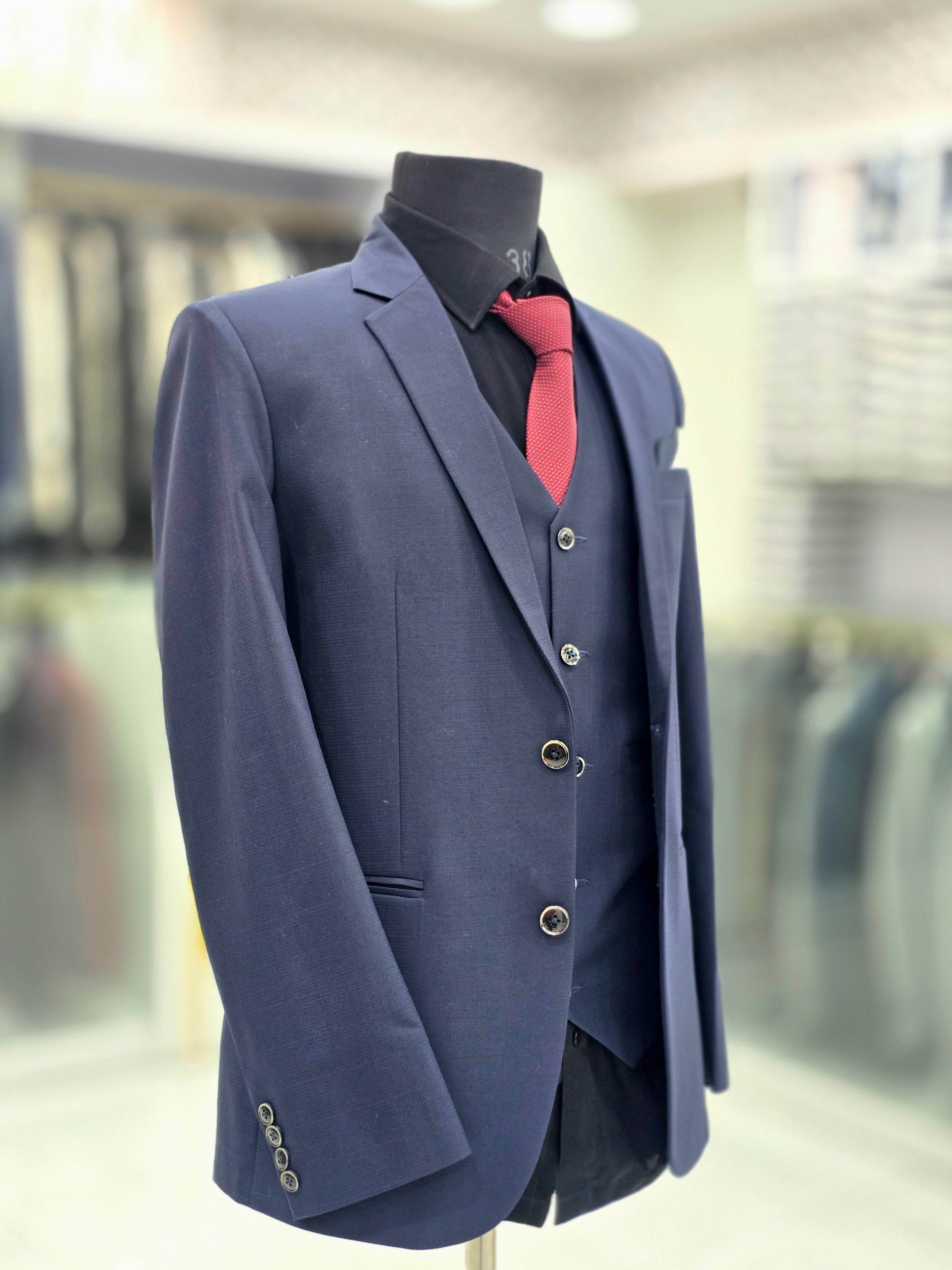 English blue coloured self design  formal three piece suit with pants blazer and double breast waistcoat