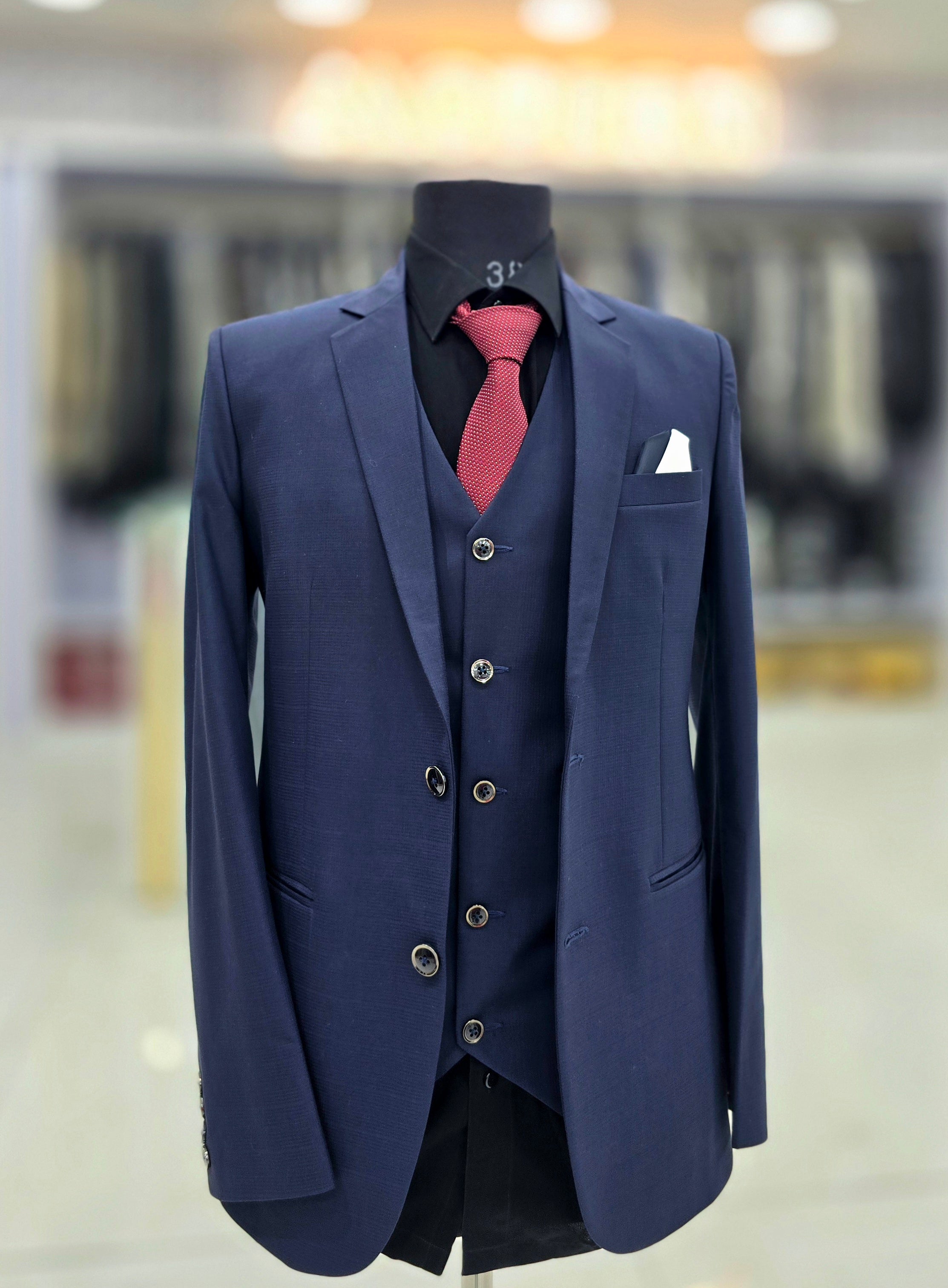 English blue coloured self design  formal three piece suit with pants blazer and double breast waistcoat