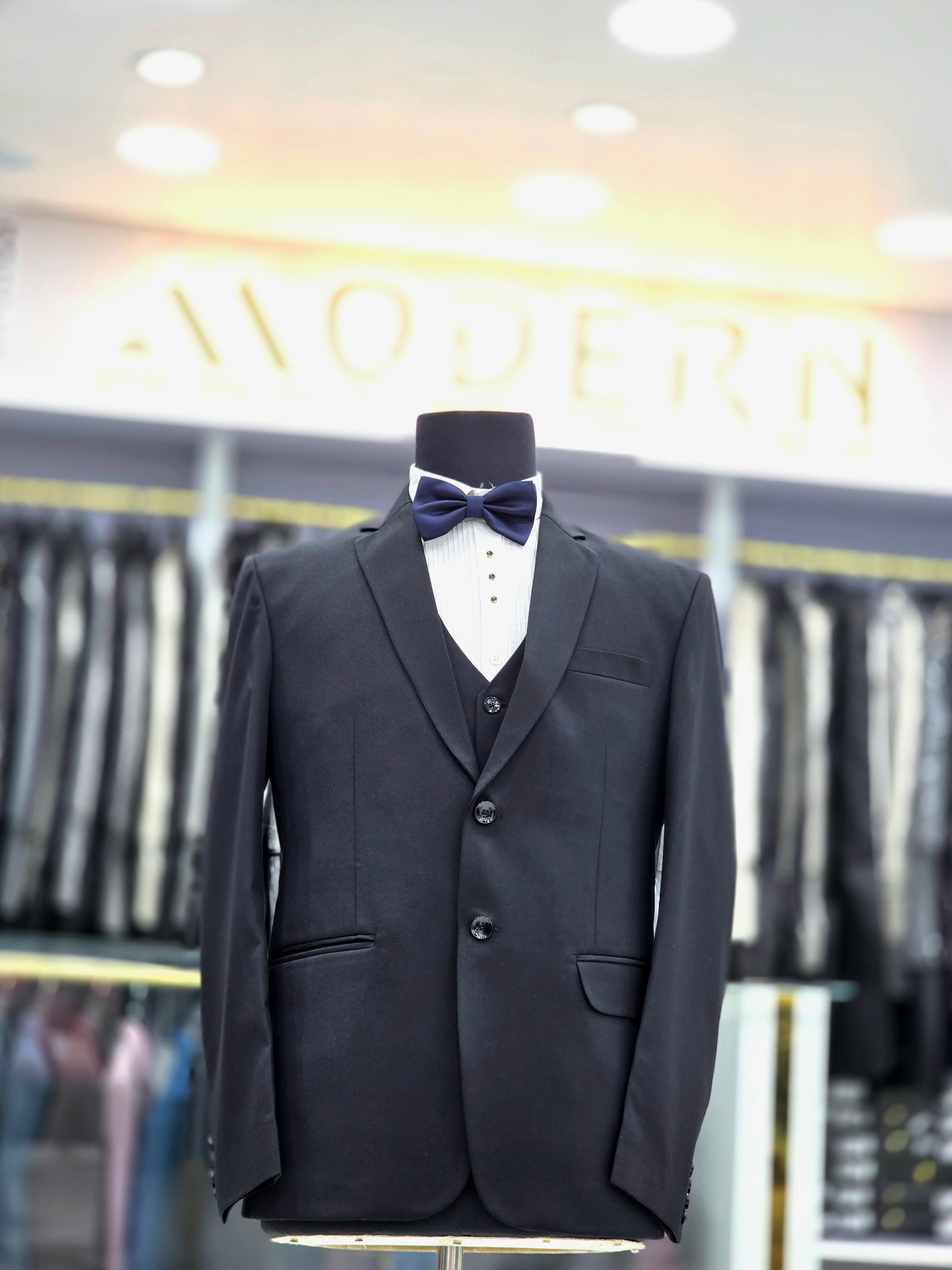 Classic black formal three piece suit with blazer waistcoat and pants