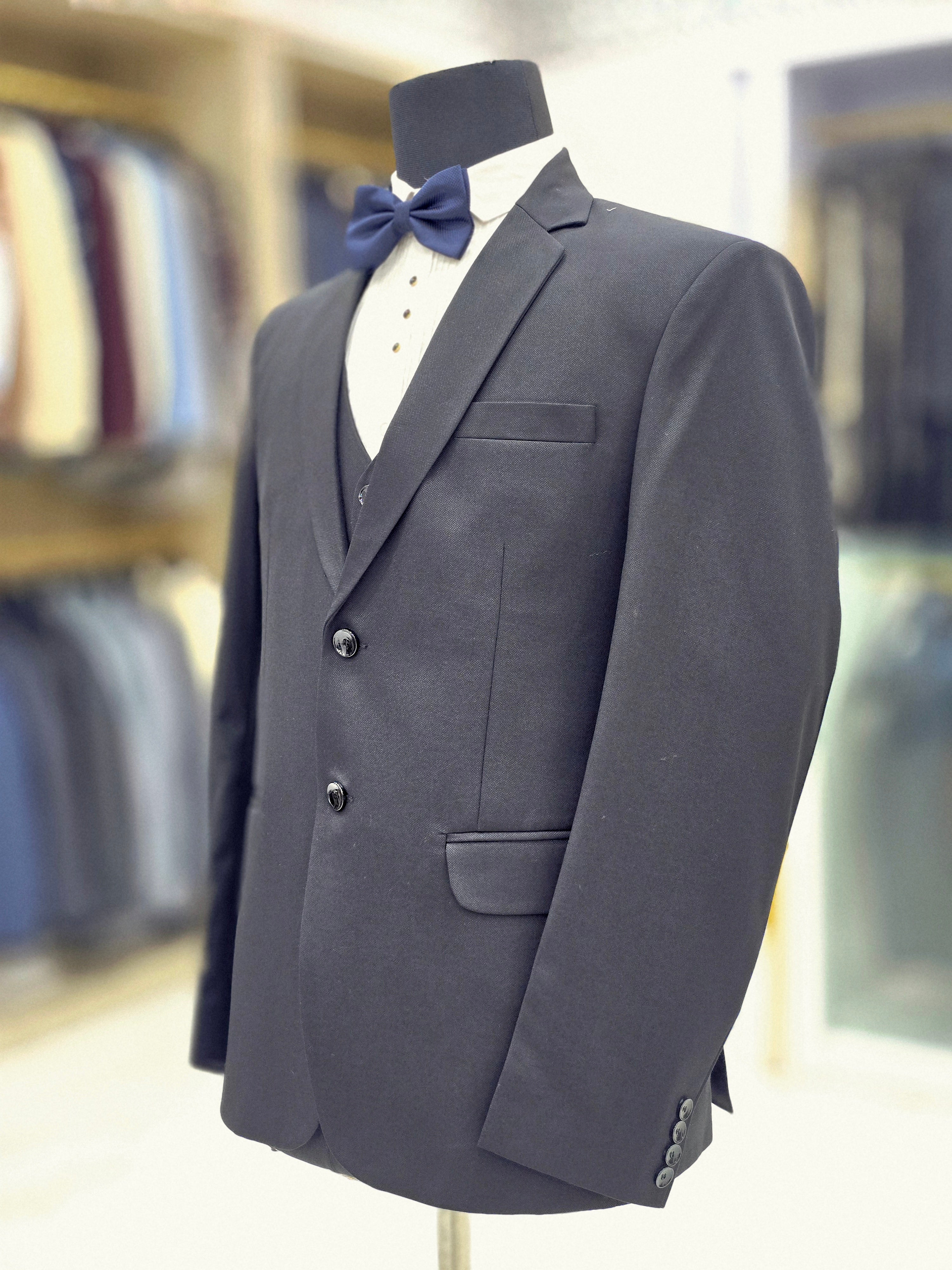 Classic black formal three piece suit with blazer waistcoat and pants
