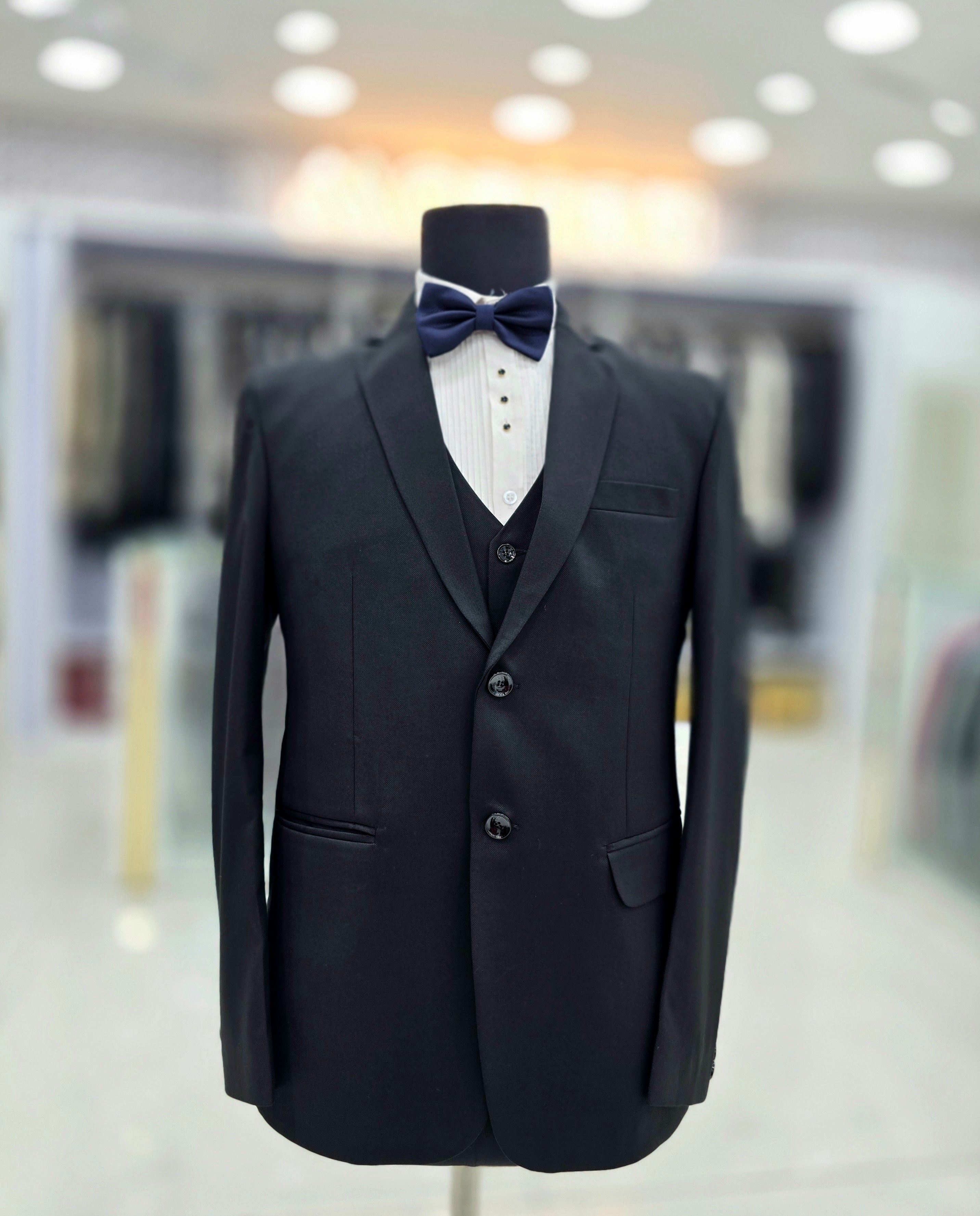 Classic black formal three piece suit with blazer waistcoat and pants