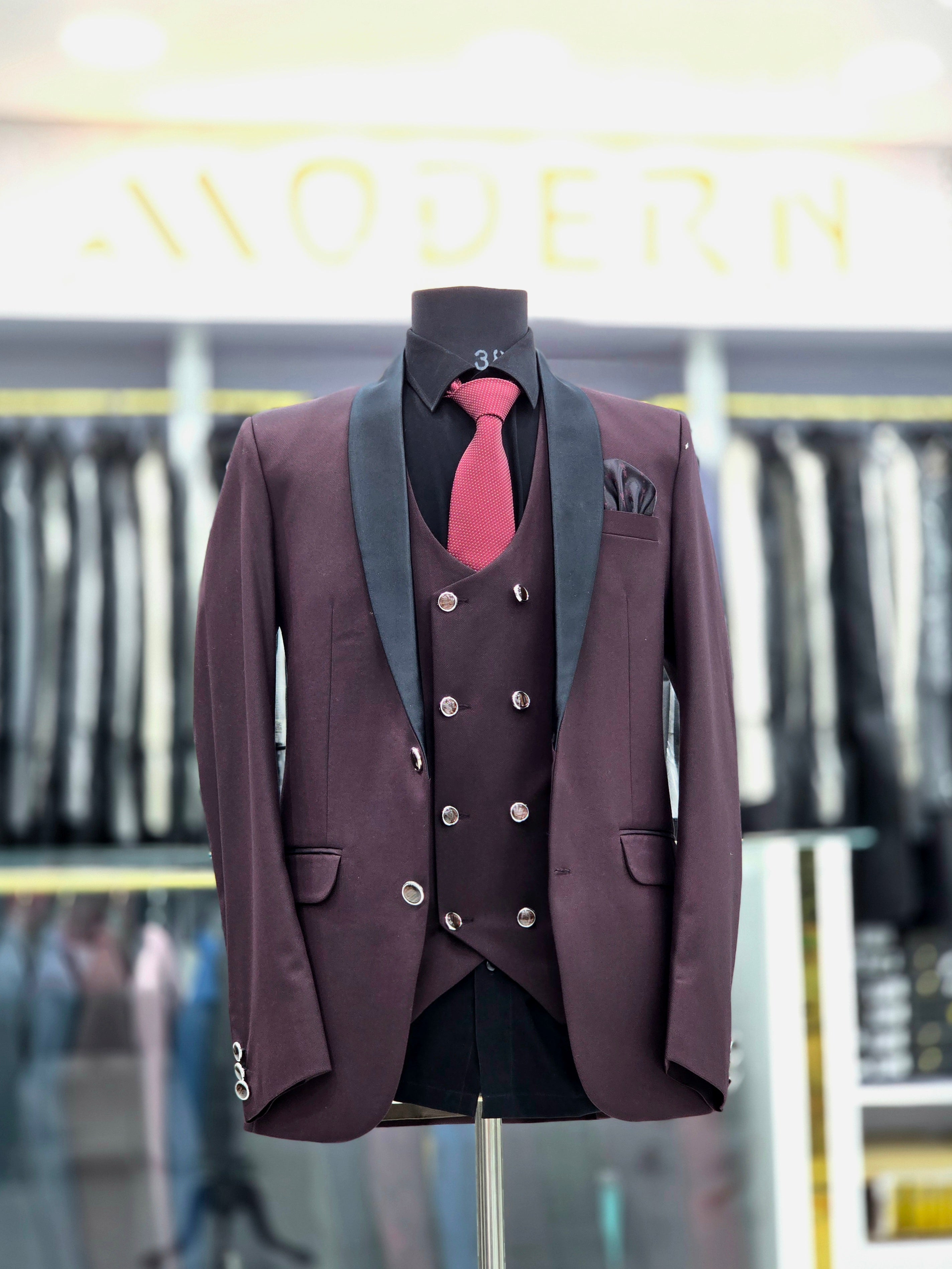 Elegant wine coloured formal three piece Tuxedo with pants blazer and double breast waistcoat