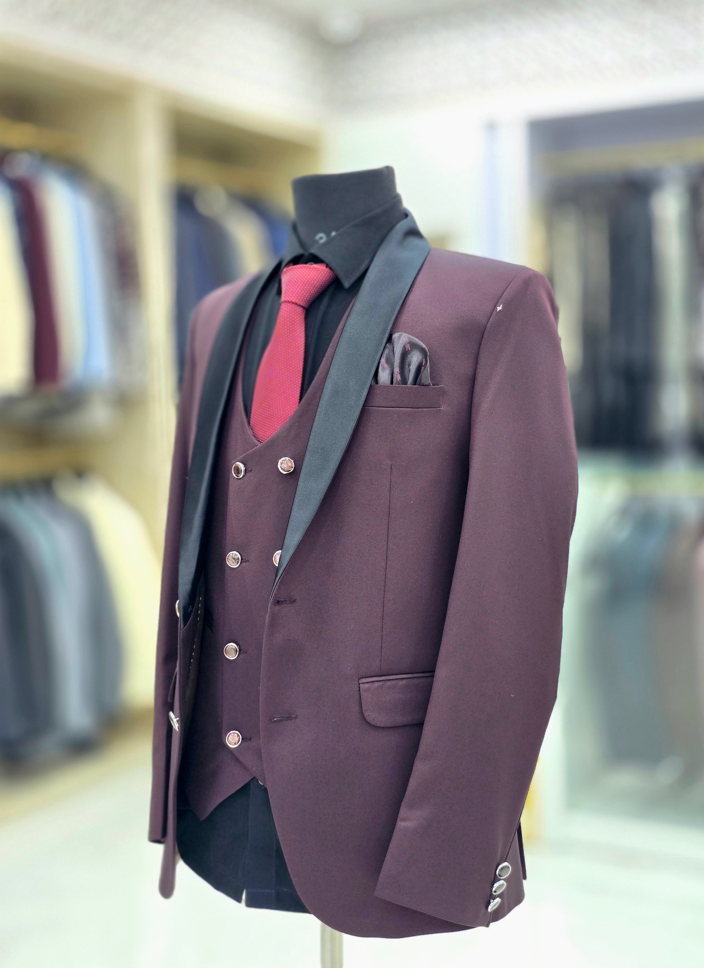 Elegant wine coloured formal three piece Tuxedo with pants blazer and double breast waistcoat