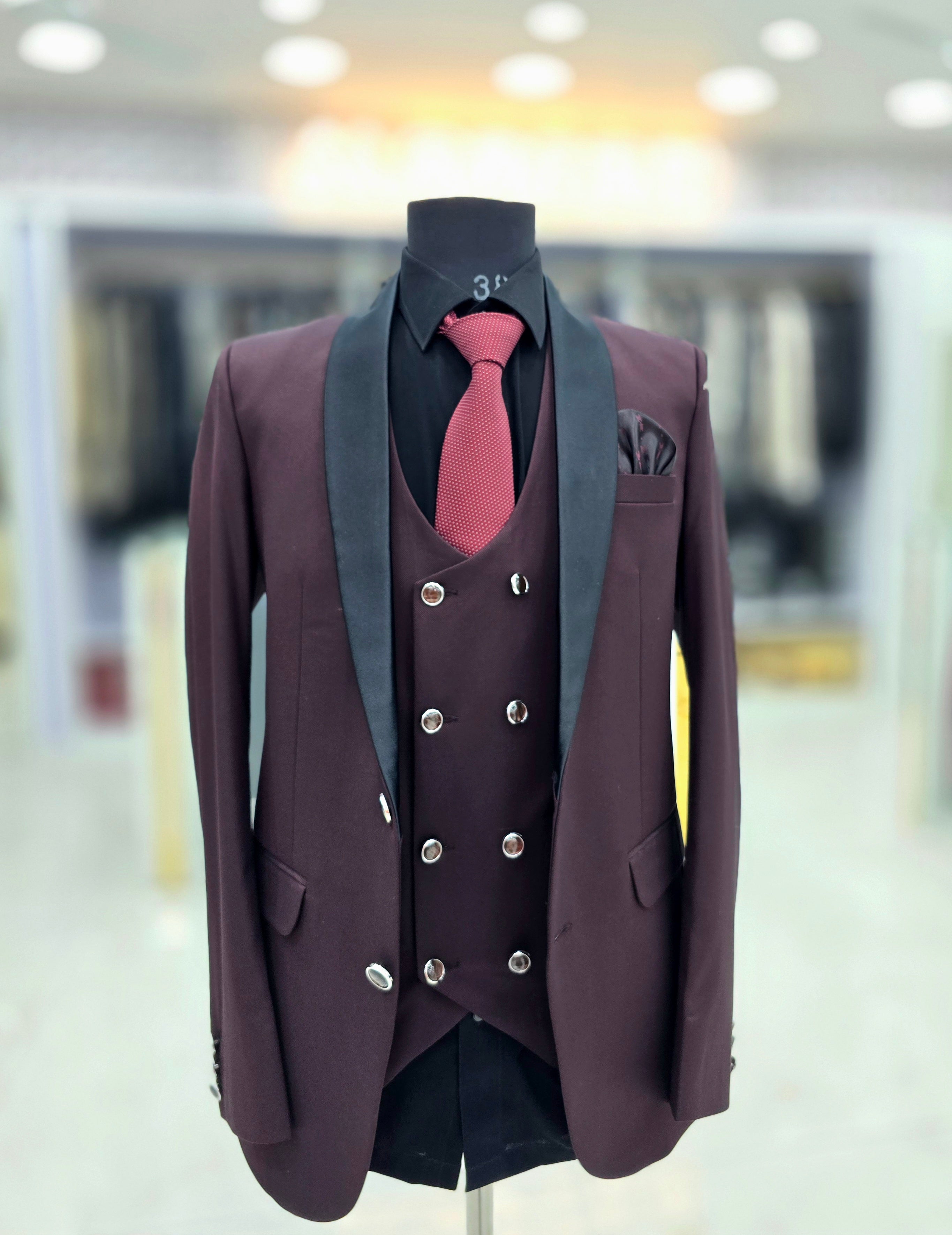 Elegant wine coloured formal three piece Tuxedo with pants blazer and double breast waistcoat