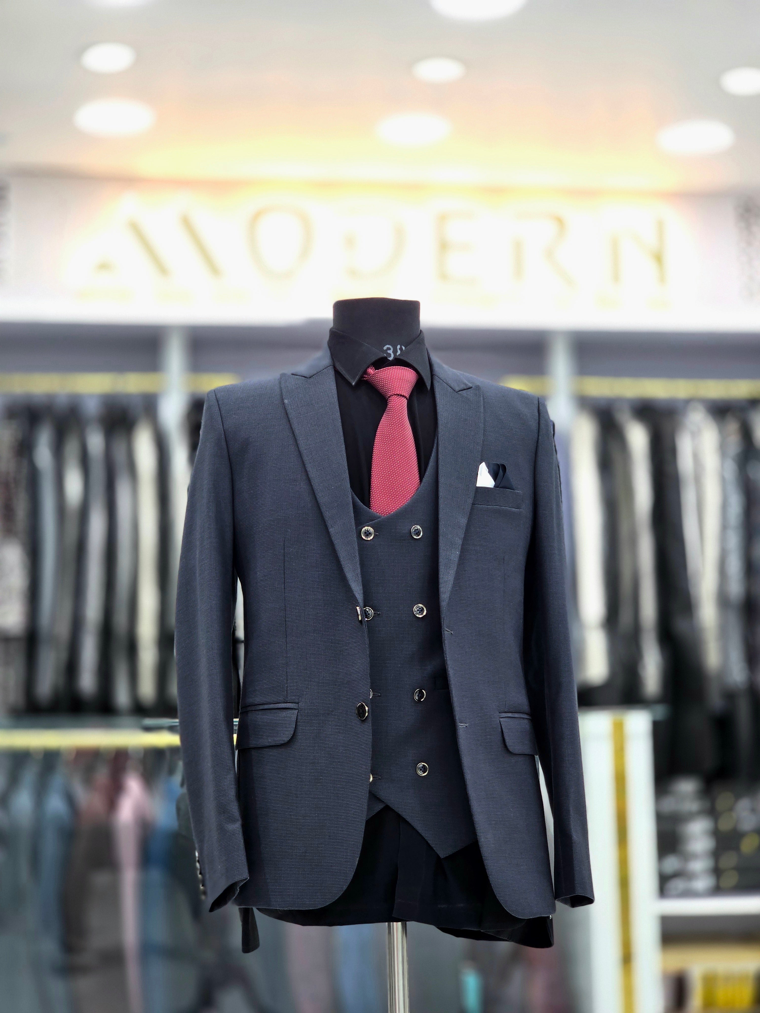 Classic blue colour formal three piece suit with blazer pants and double breast waistcoat