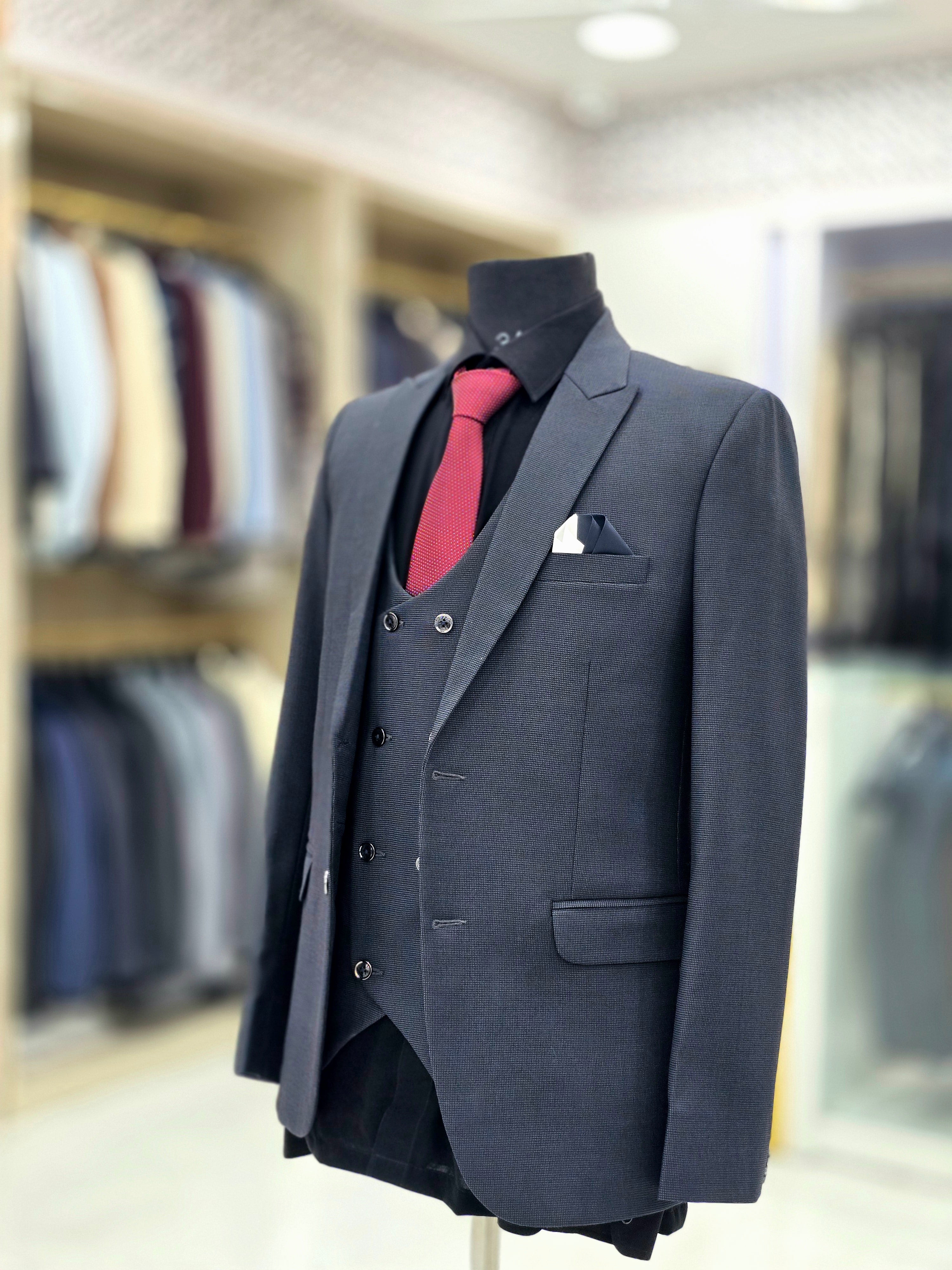 Classic blue colour formal three piece suit with blazer pants and double breast waistcoat