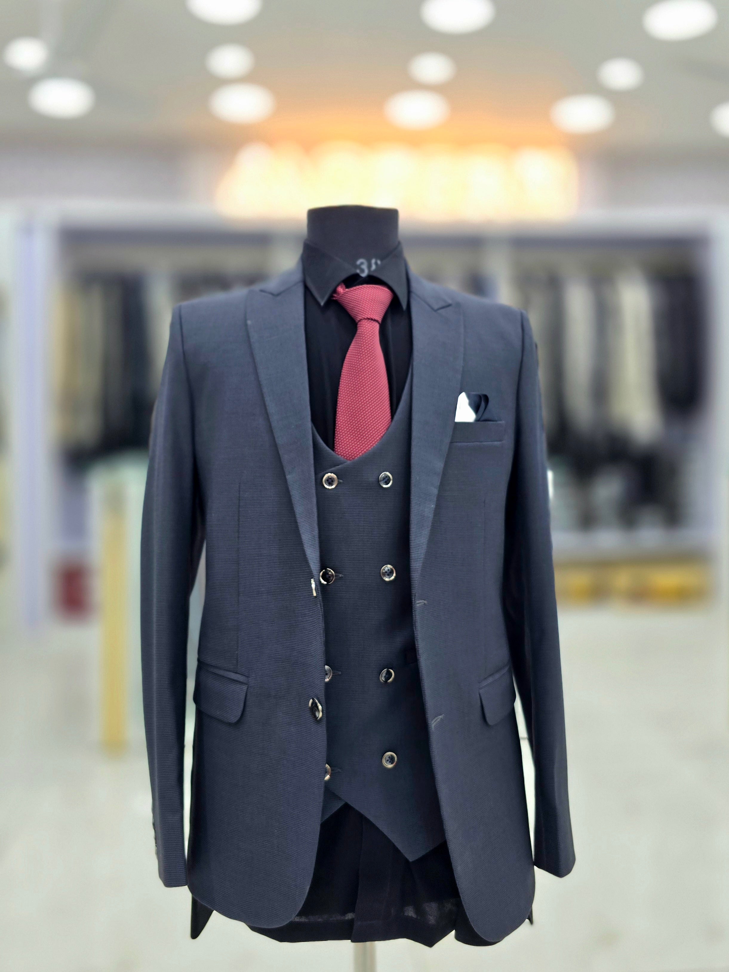 Classic blue colour formal three piece suit with blazer pants and double breast waistcoat