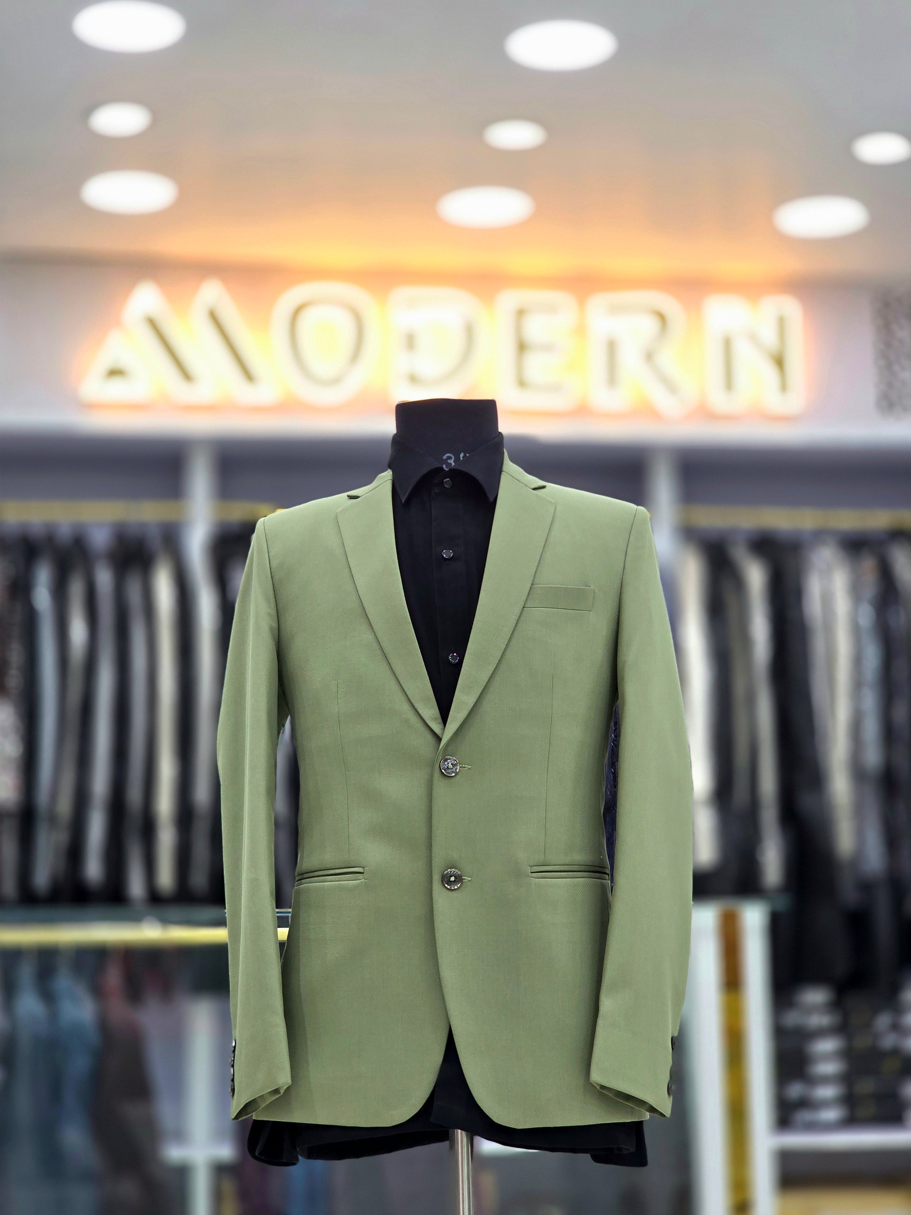 Classic green formal two piece suit with pants and blazer