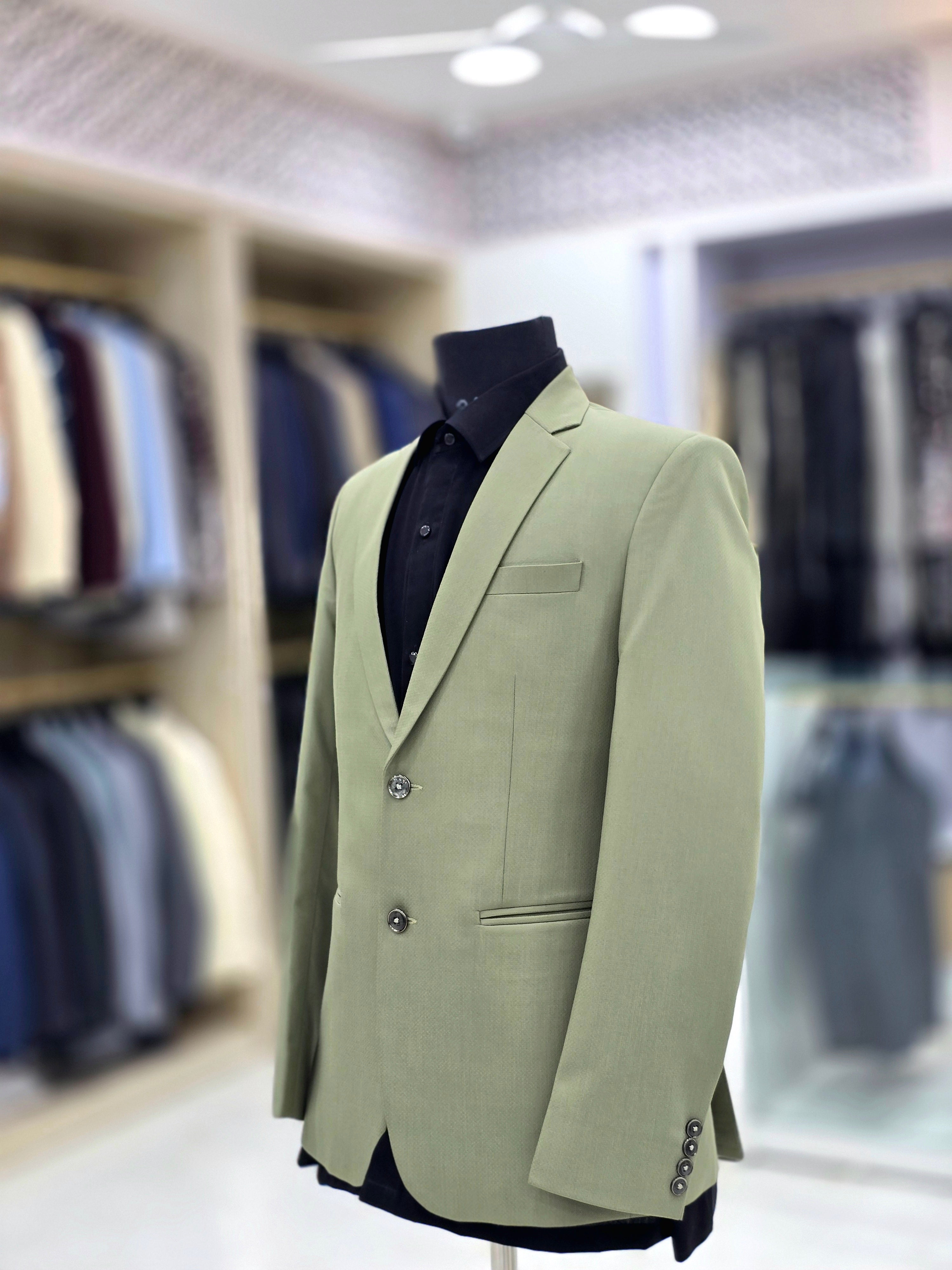 Classic green formal two piece suit with pants and blazer