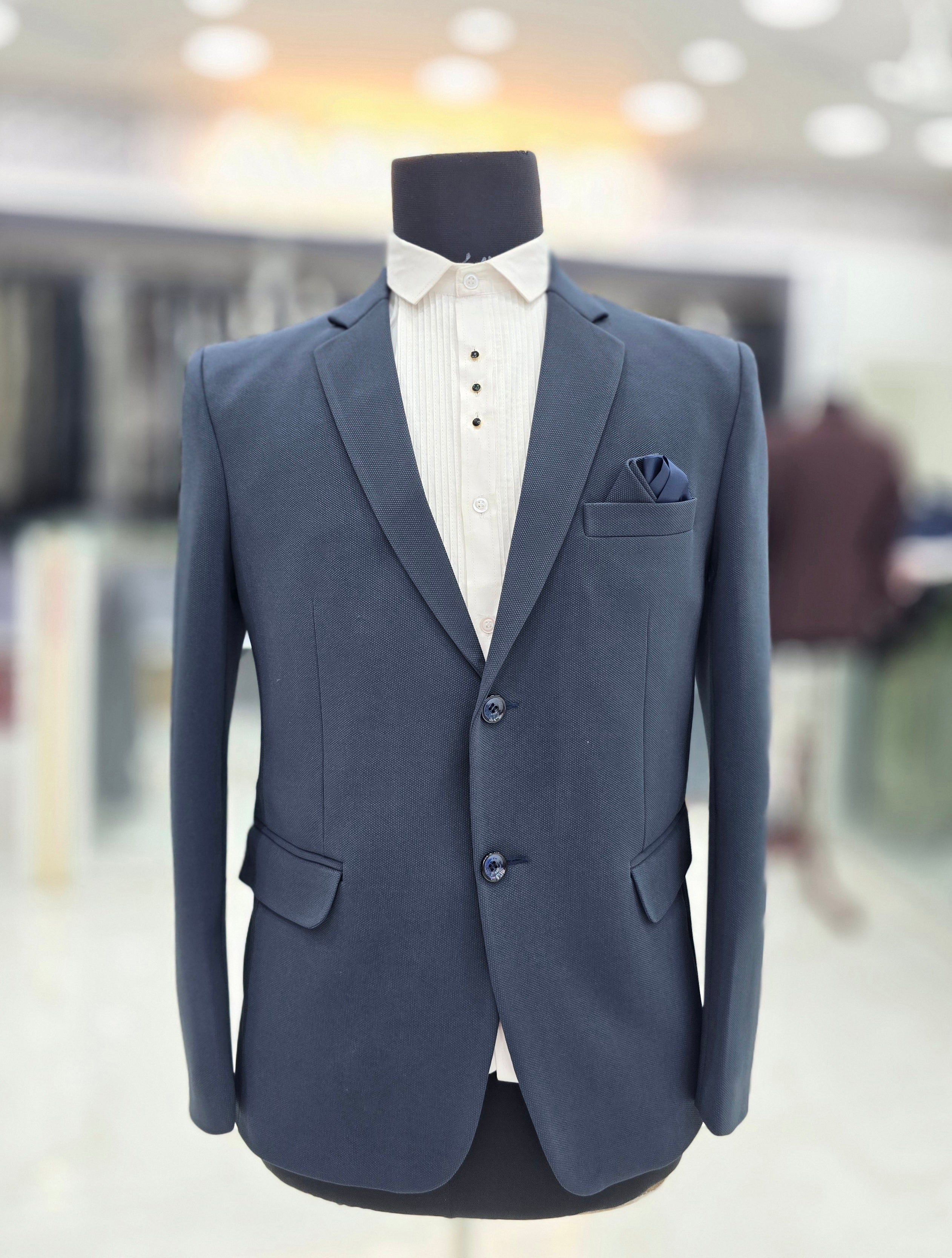 Navy blue coloured formal blazer with stretchable fabric