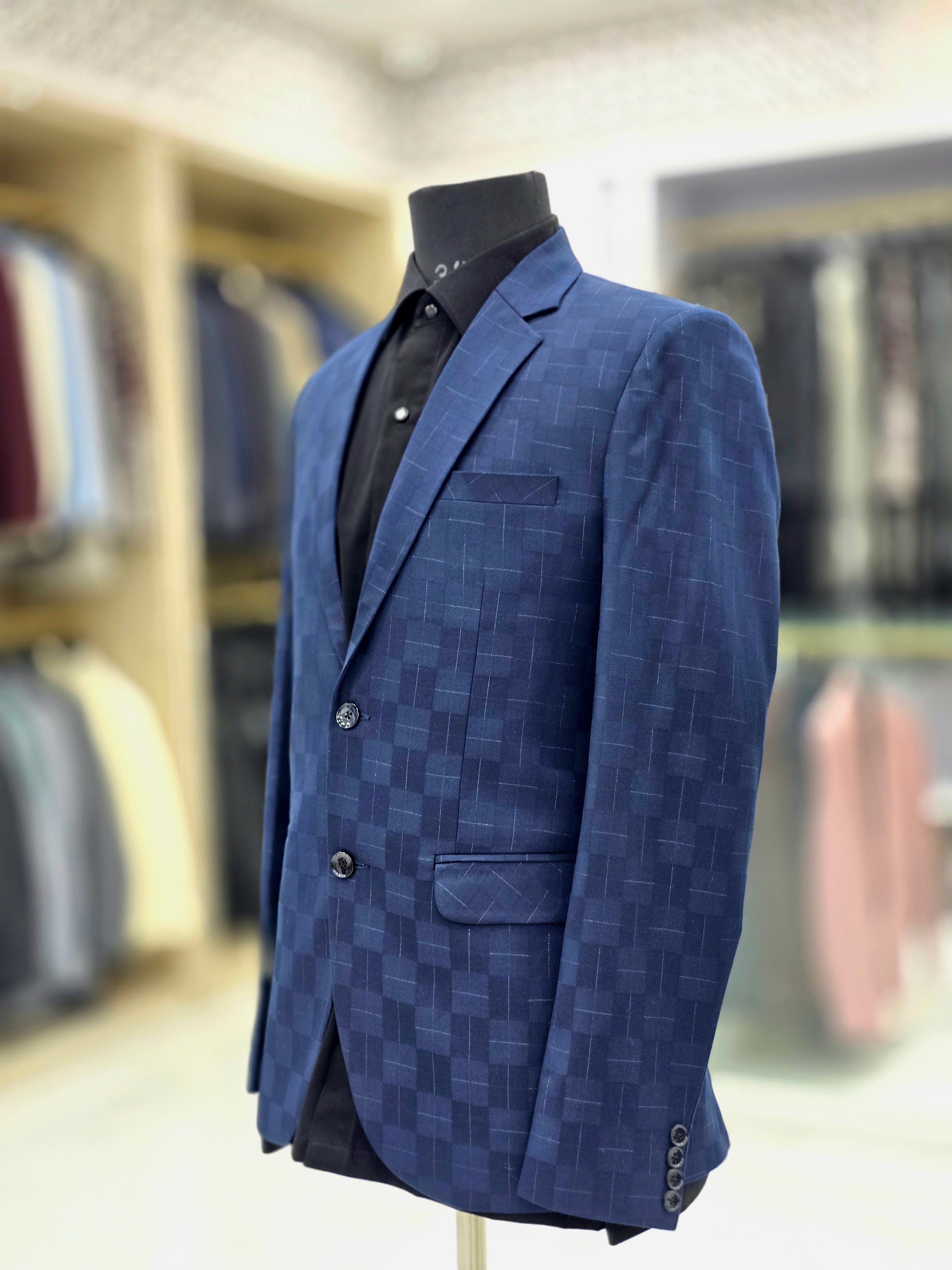 Stylish blue coloured blazer with self pattern design
