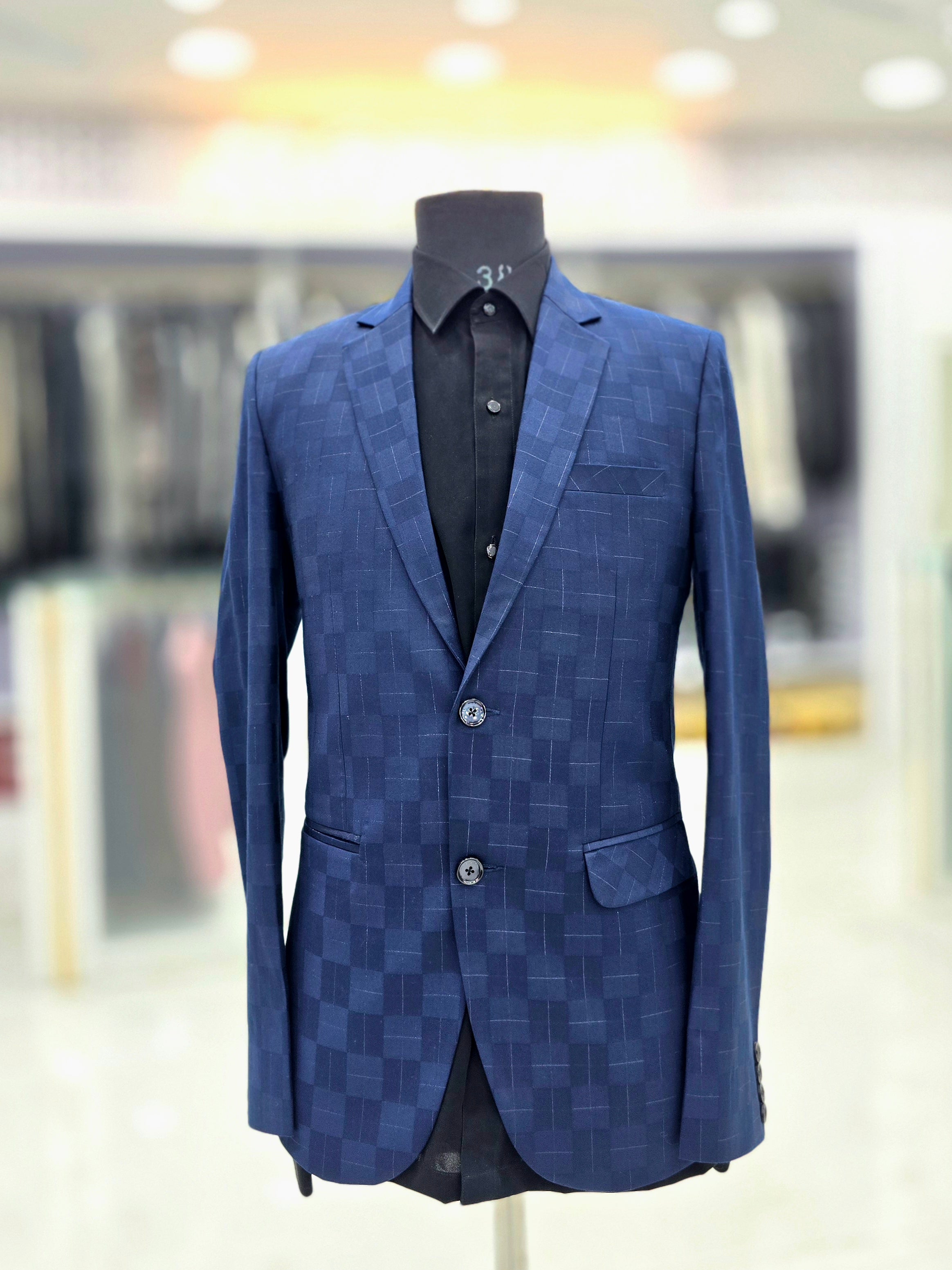Stylish blue coloured blazer with self pattern design
