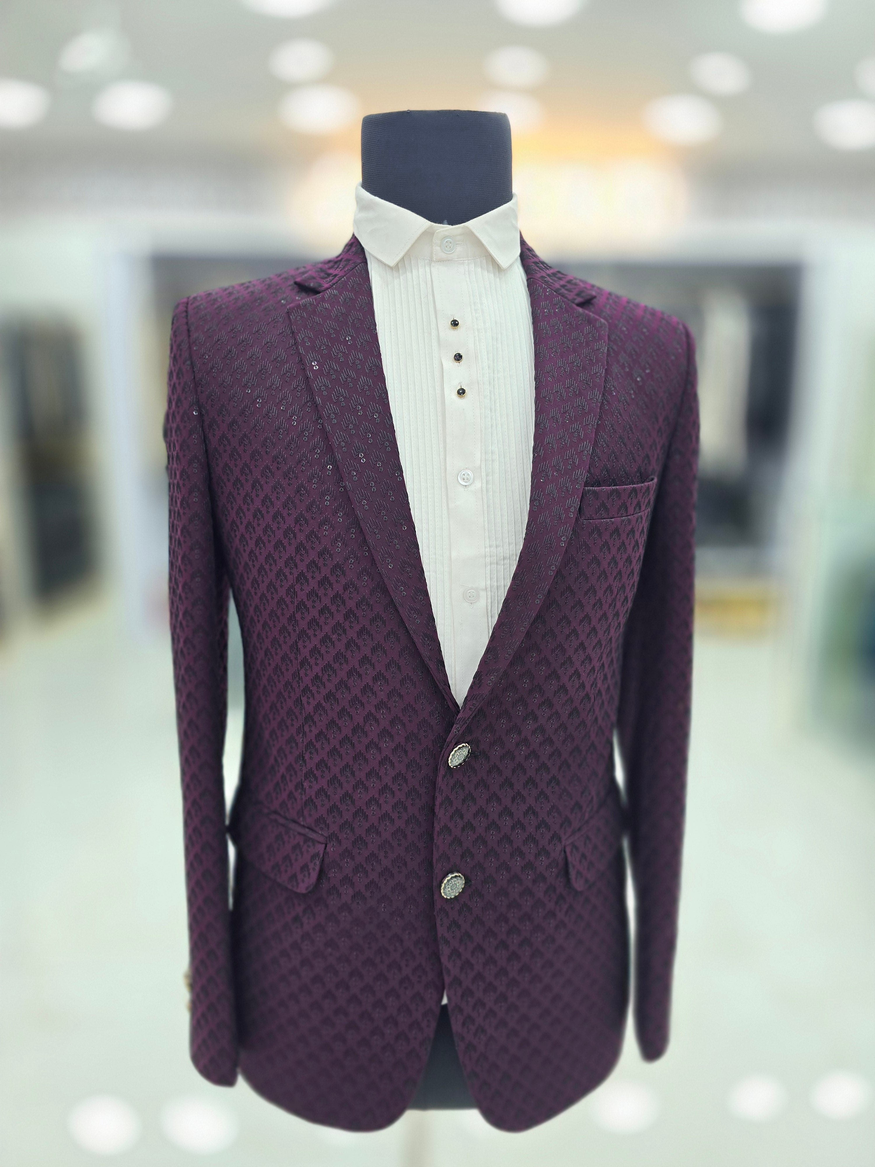 Stylish wine coloured sequence design blazer