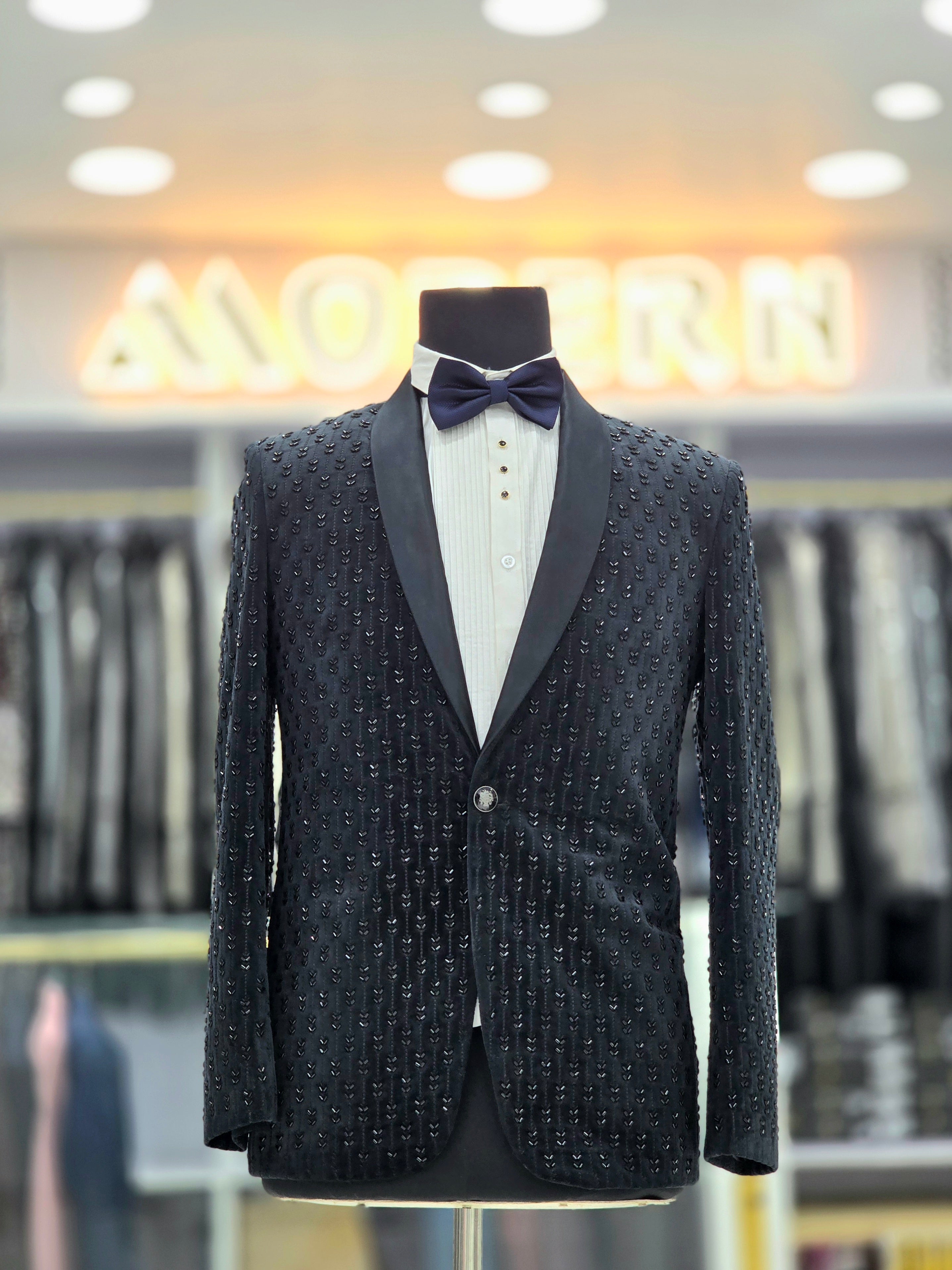 Classy black partywear Tuxedo blazer on stone embroided fabric with pants and blazer.