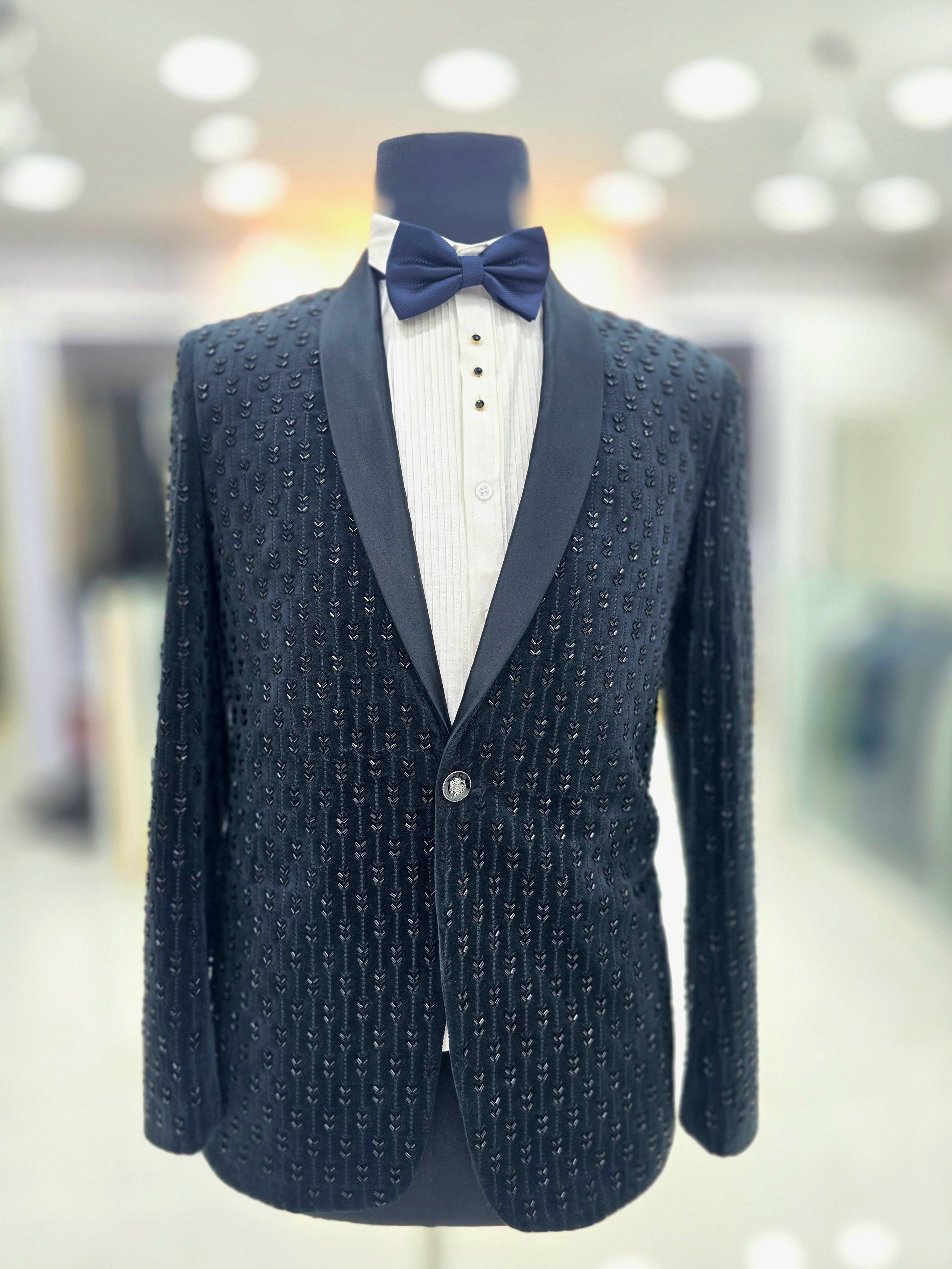 Classy black partywear Tuxedo blazer on stone embroided fabric with pants and blazer.