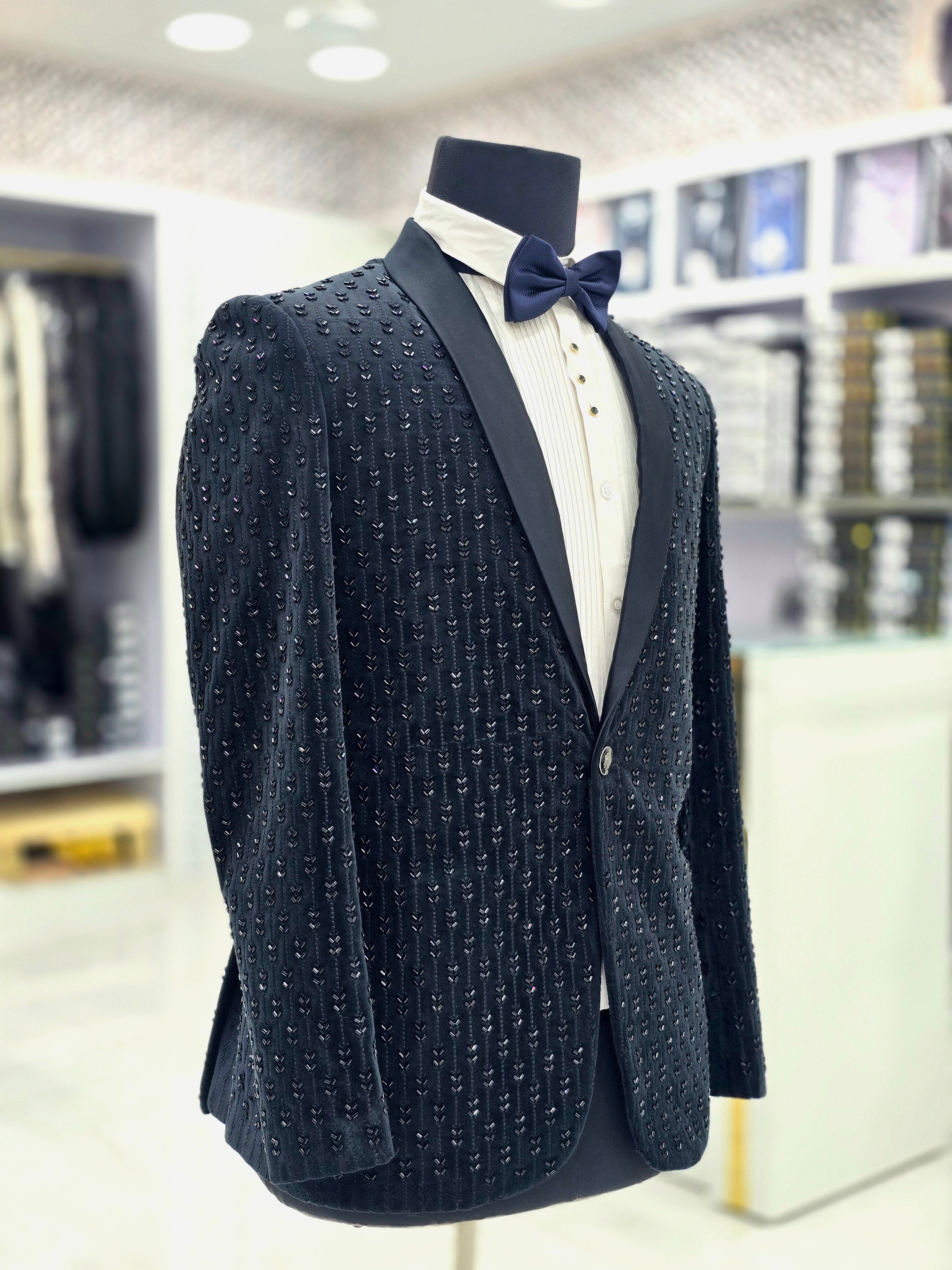 Classy black partywear Tuxedo blazer on stone embroided fabric with pants and blazer.