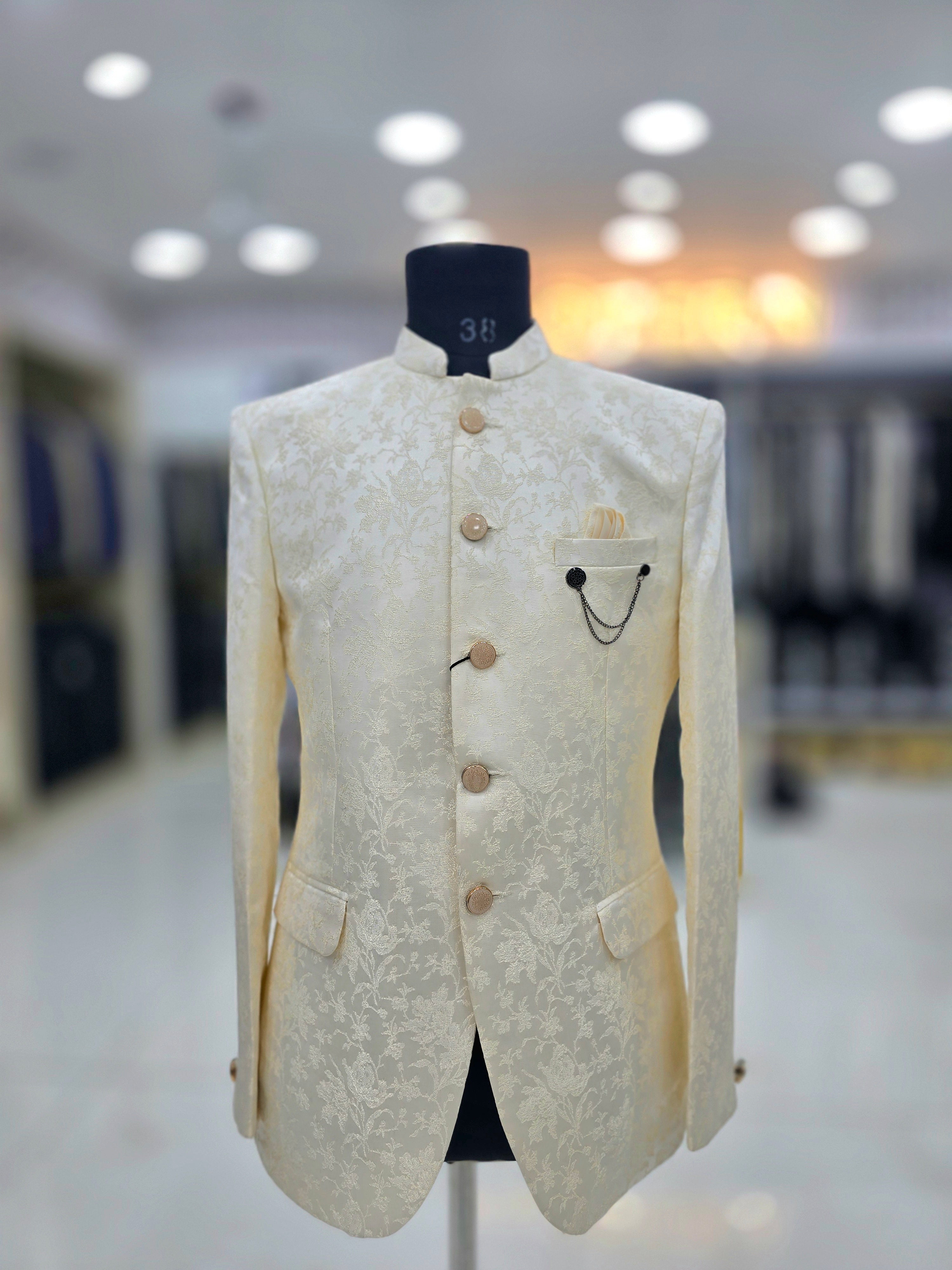 Classic cream colour Jodhpuri blazer with floral pattern and pants